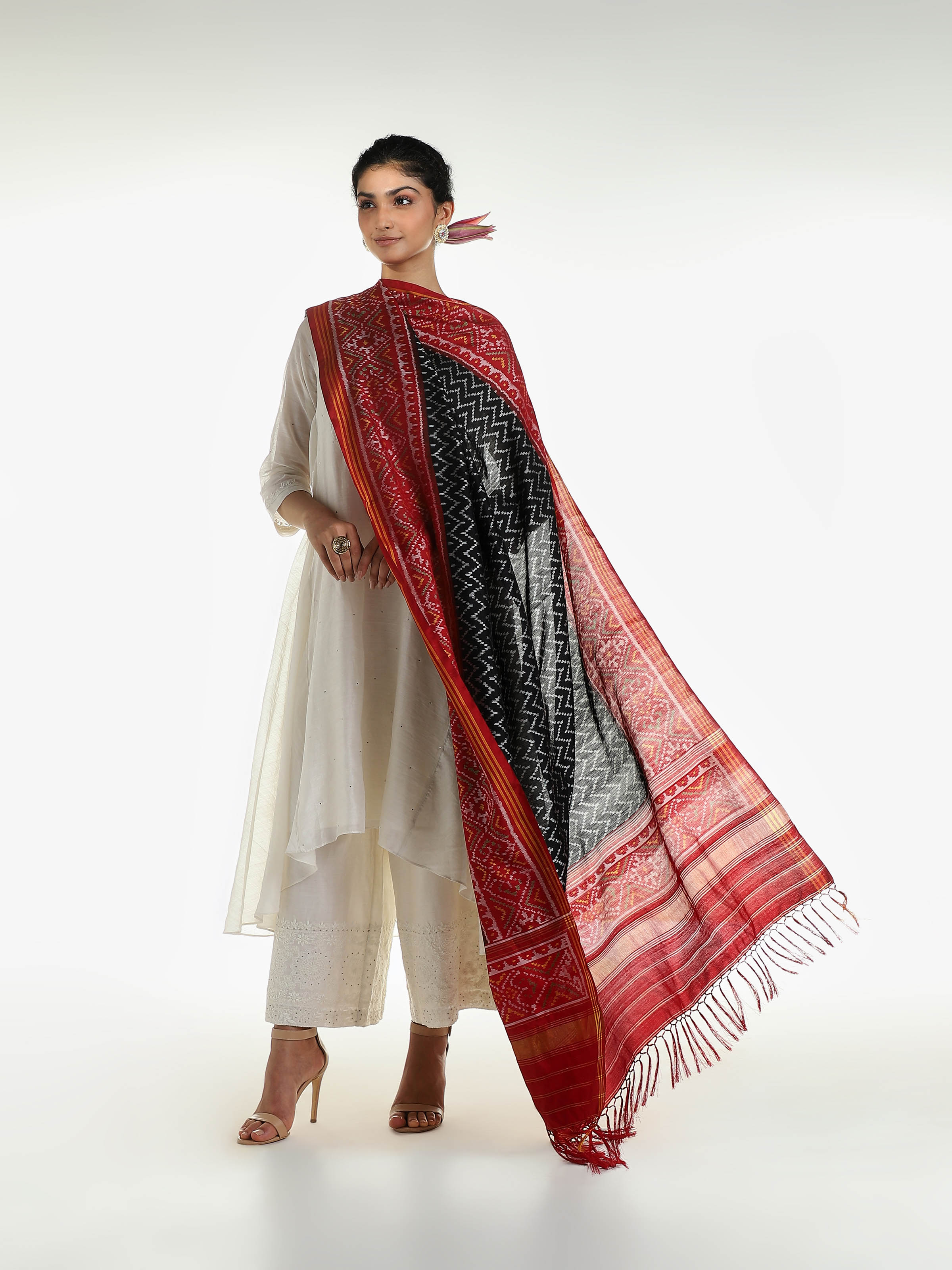 Side view of black silk Patola dupatta with elegant drape