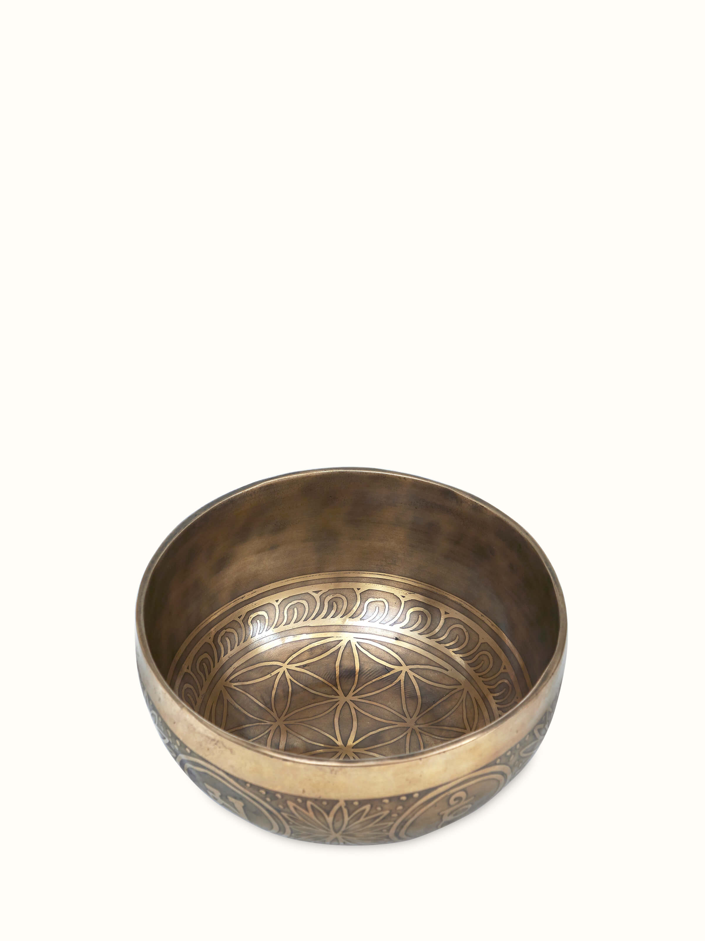 Rear view of Pankhuri Singing Bowl (6 Inches) focusing on the engraved base and metallic finish