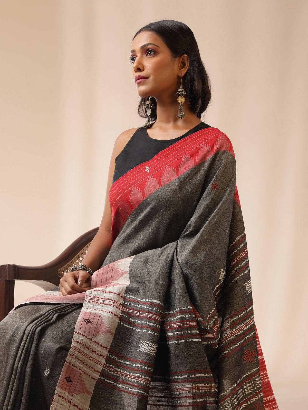 Full lifestyle shot of brown Kotpad saree showcasing texture and pallu design