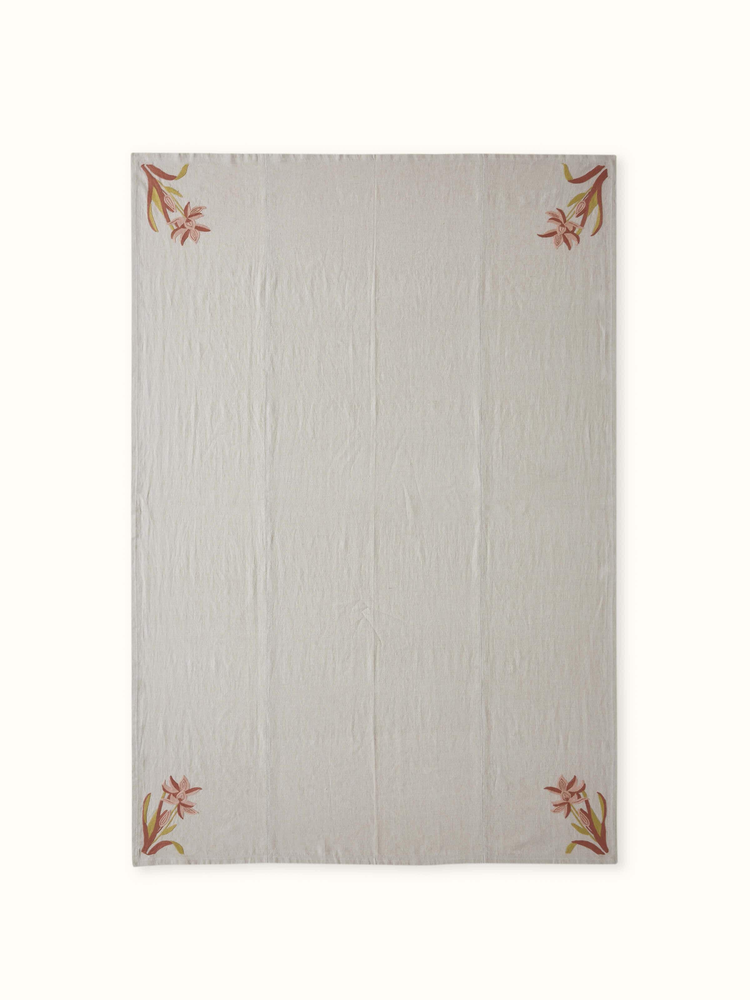 Front view capturing the soft beige tone and handcrafted embellishments