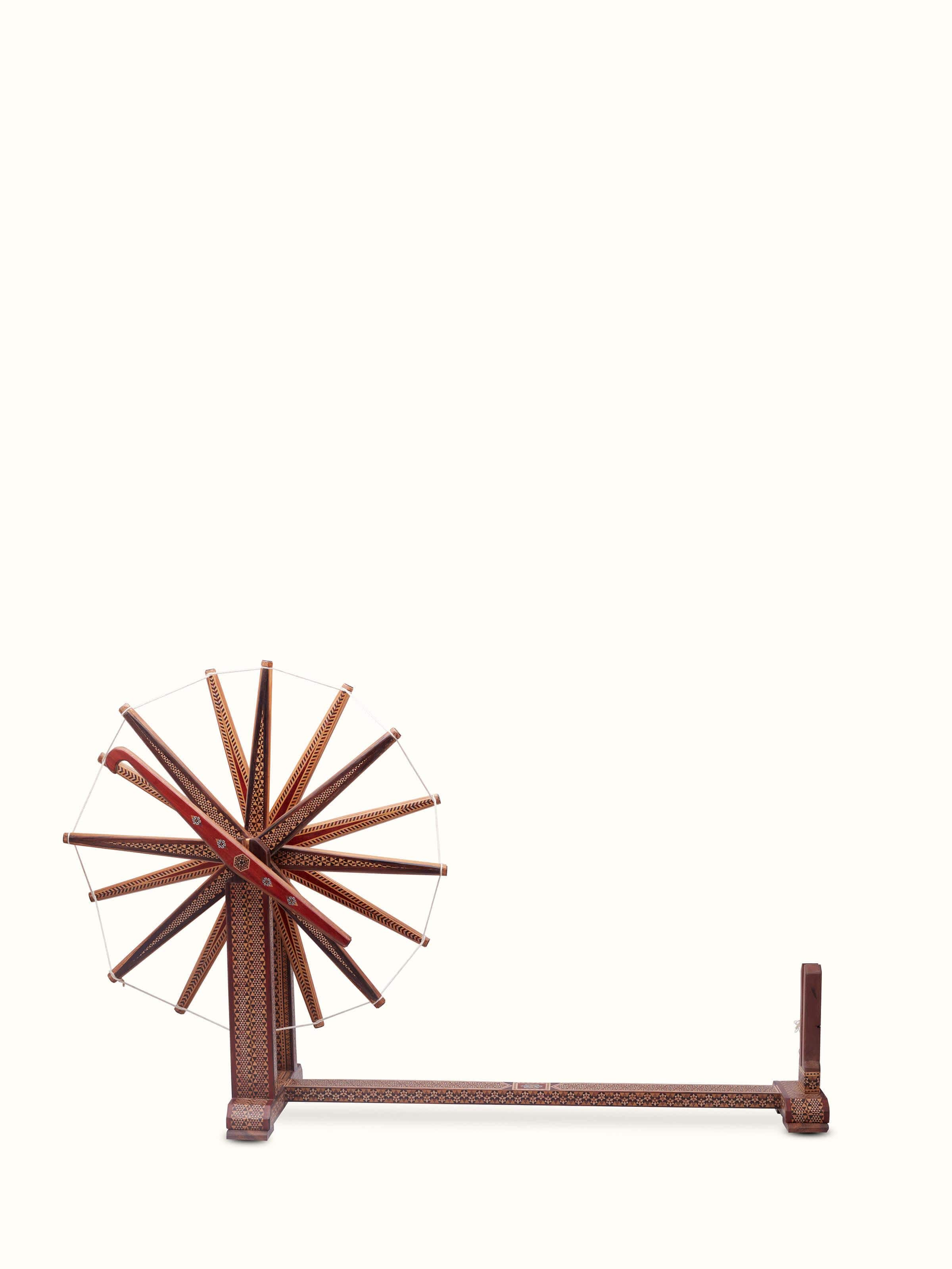 Front view of Marquetry Rosewood Charkha in Multicolor