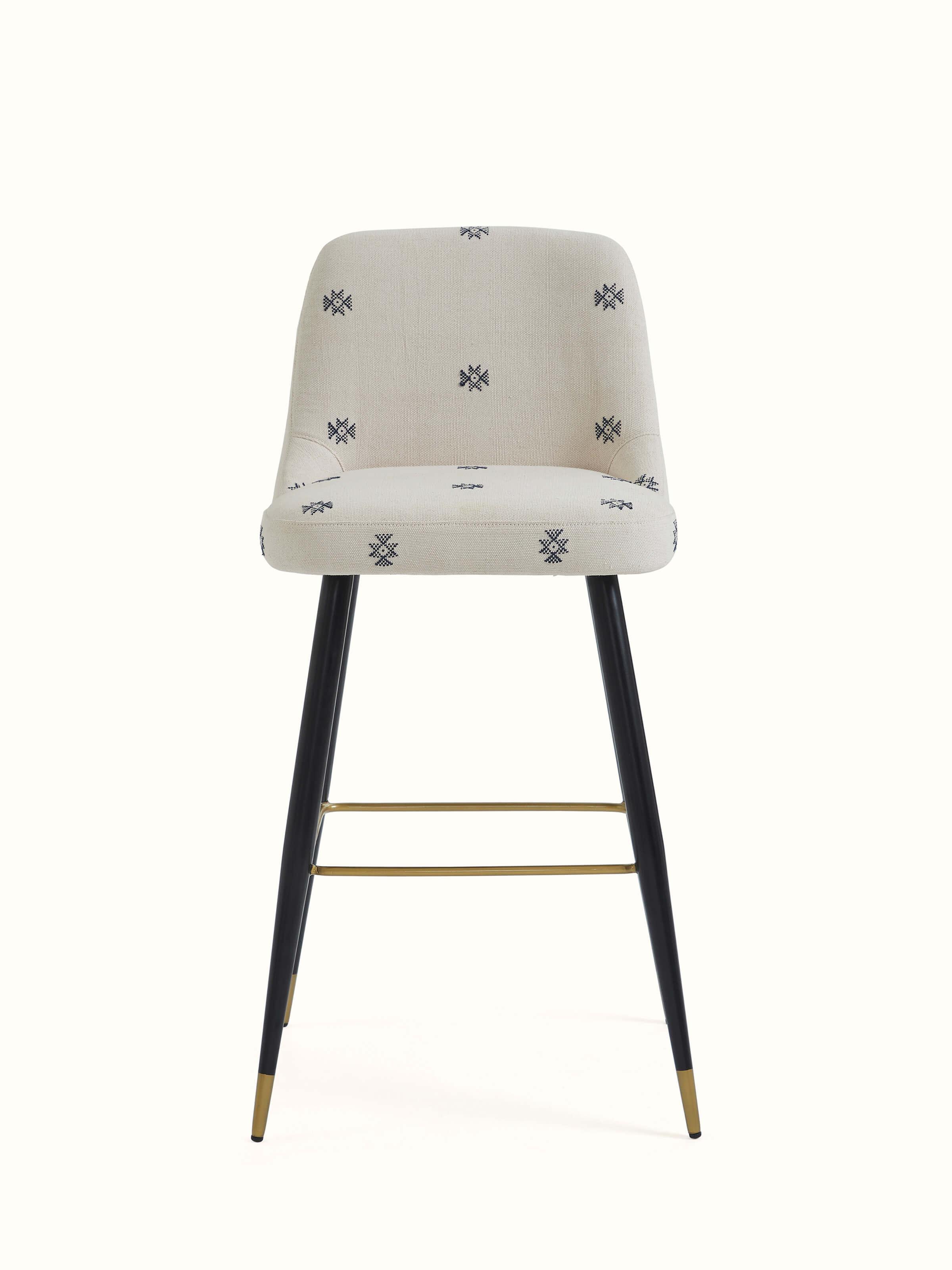 Front view of Upholstered Metal Bar Chair featuring modern upholstery and sturdy metal frame design.