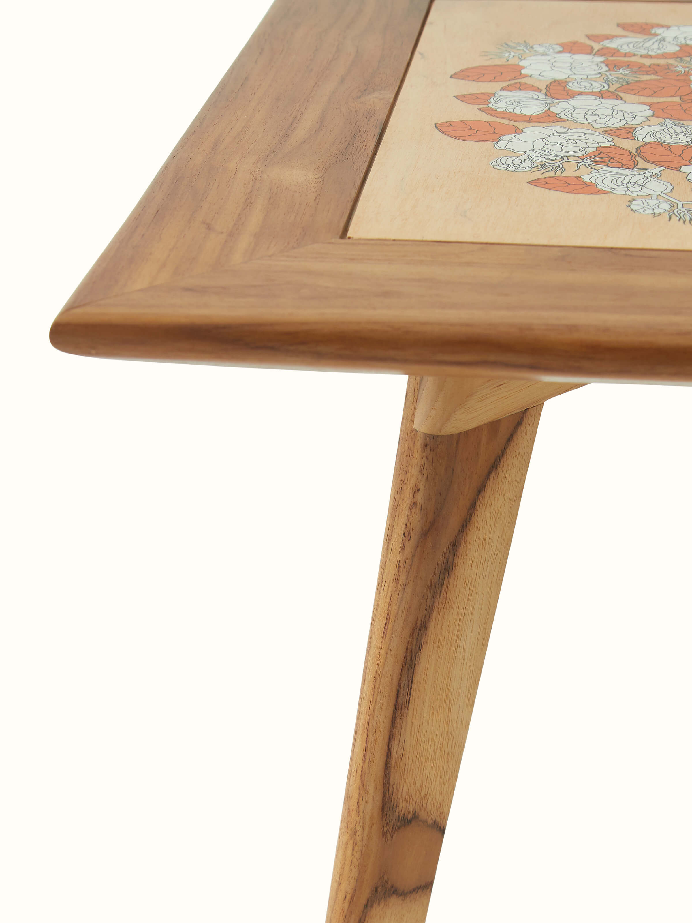 Detailed shot of the edge and leg design of the Teak wood pattachitra square side table, highlighting the fine woodwork