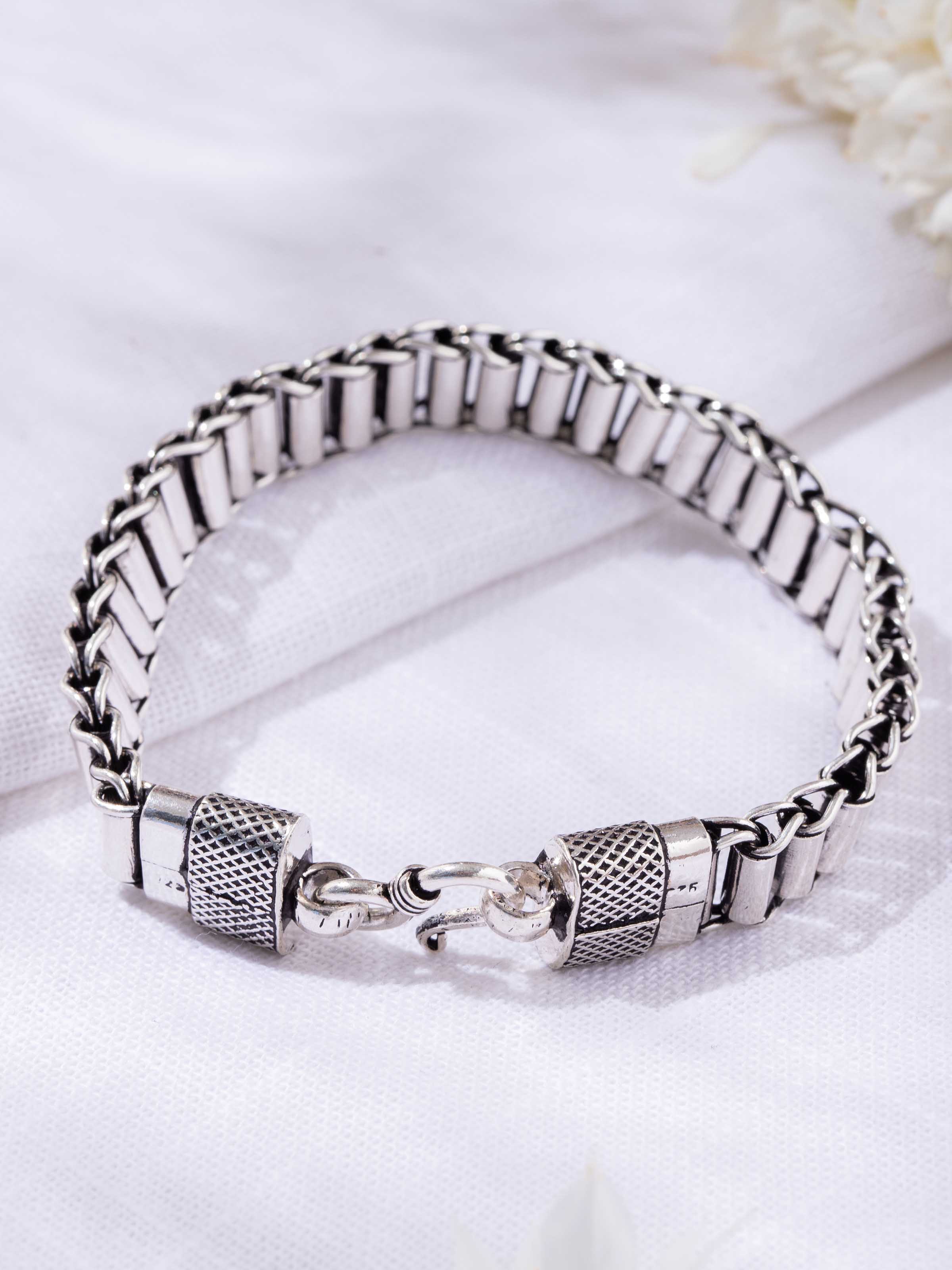 Second lifestyle view of silver bracelet styled with casual outfit