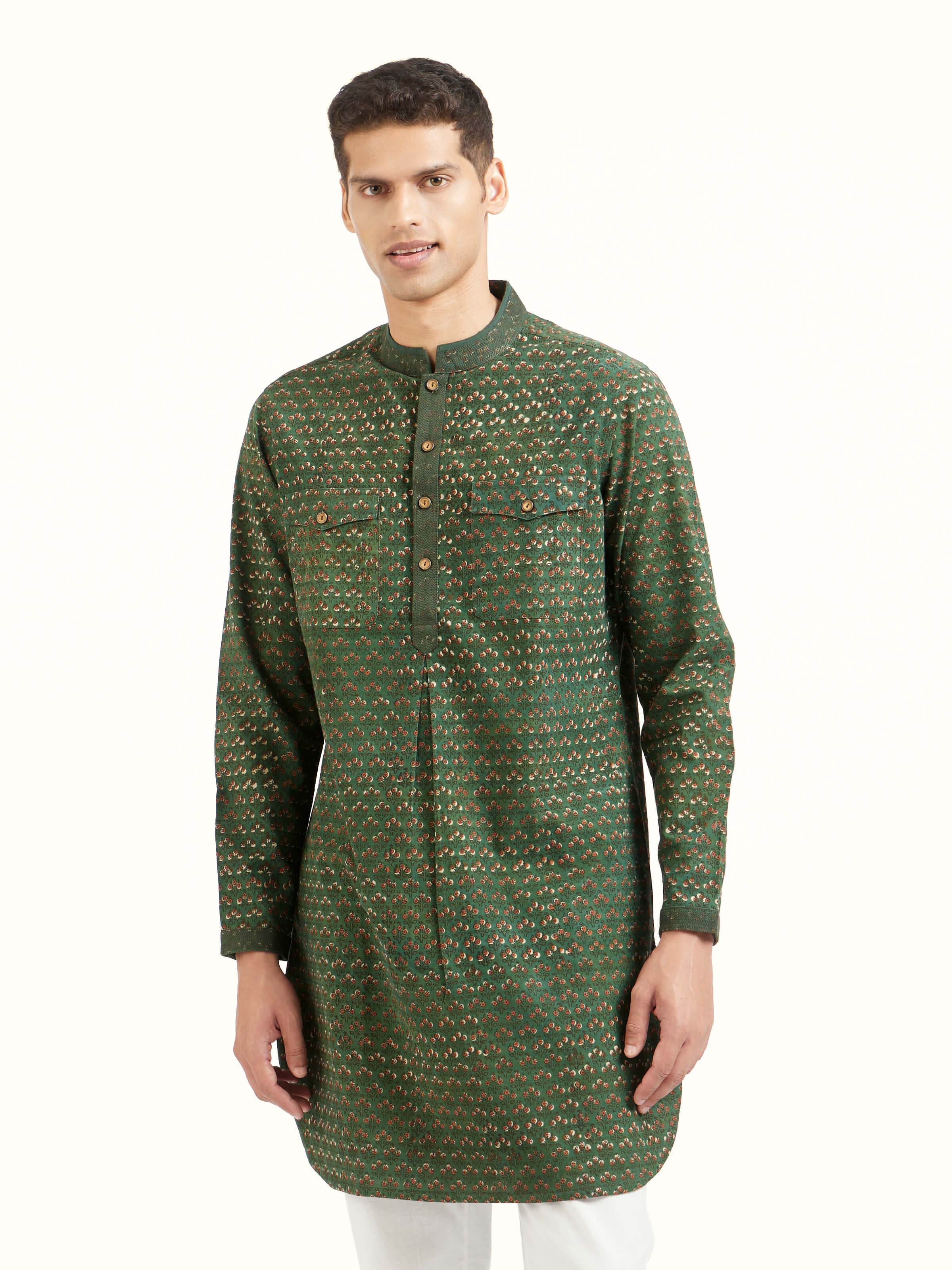 Angled view of teal cotton phad block printed kurta highlighting overall pattern and craftsmanship