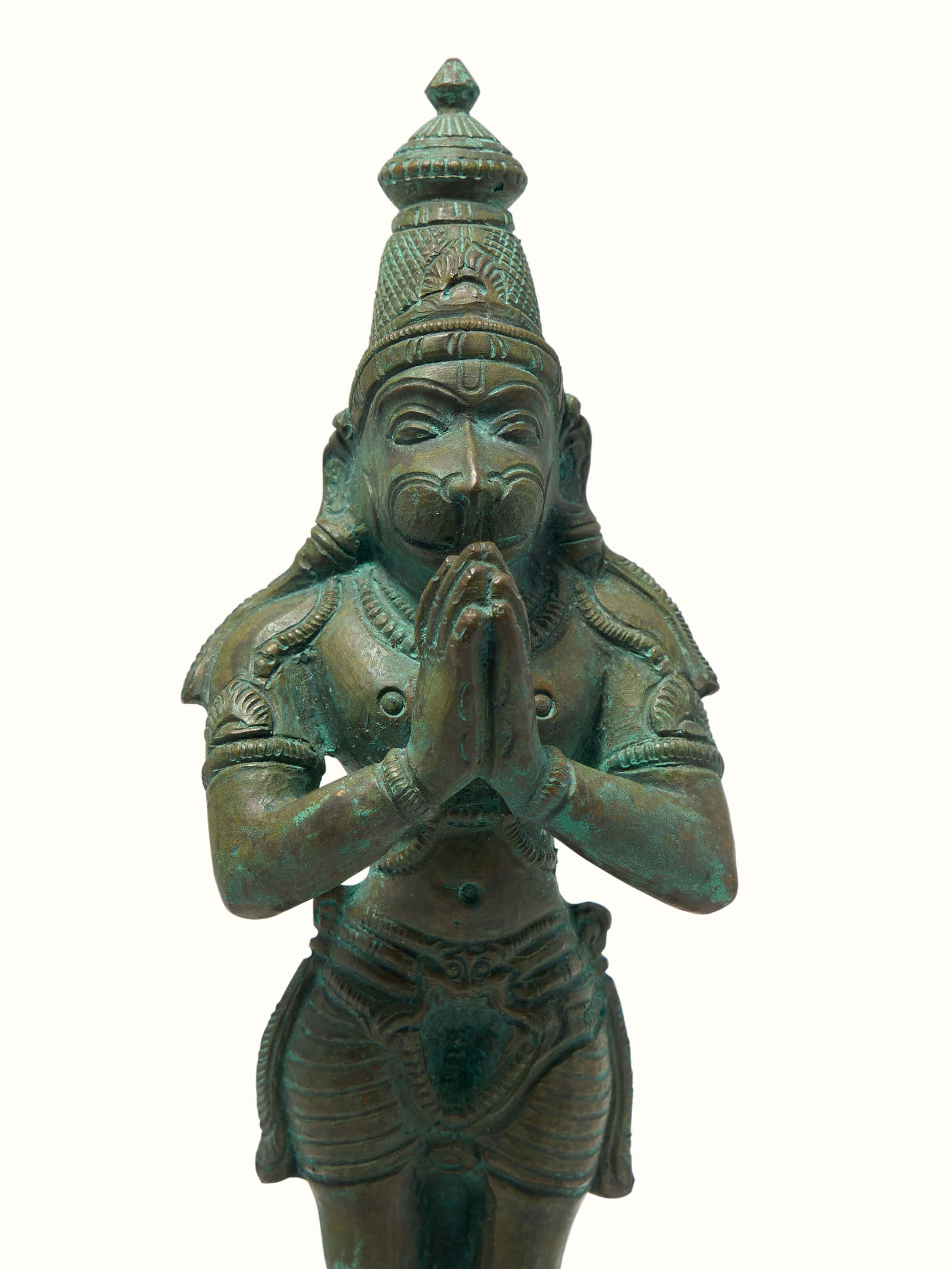 Close-up detail of bronze Hanuman casting idol showing metalwork