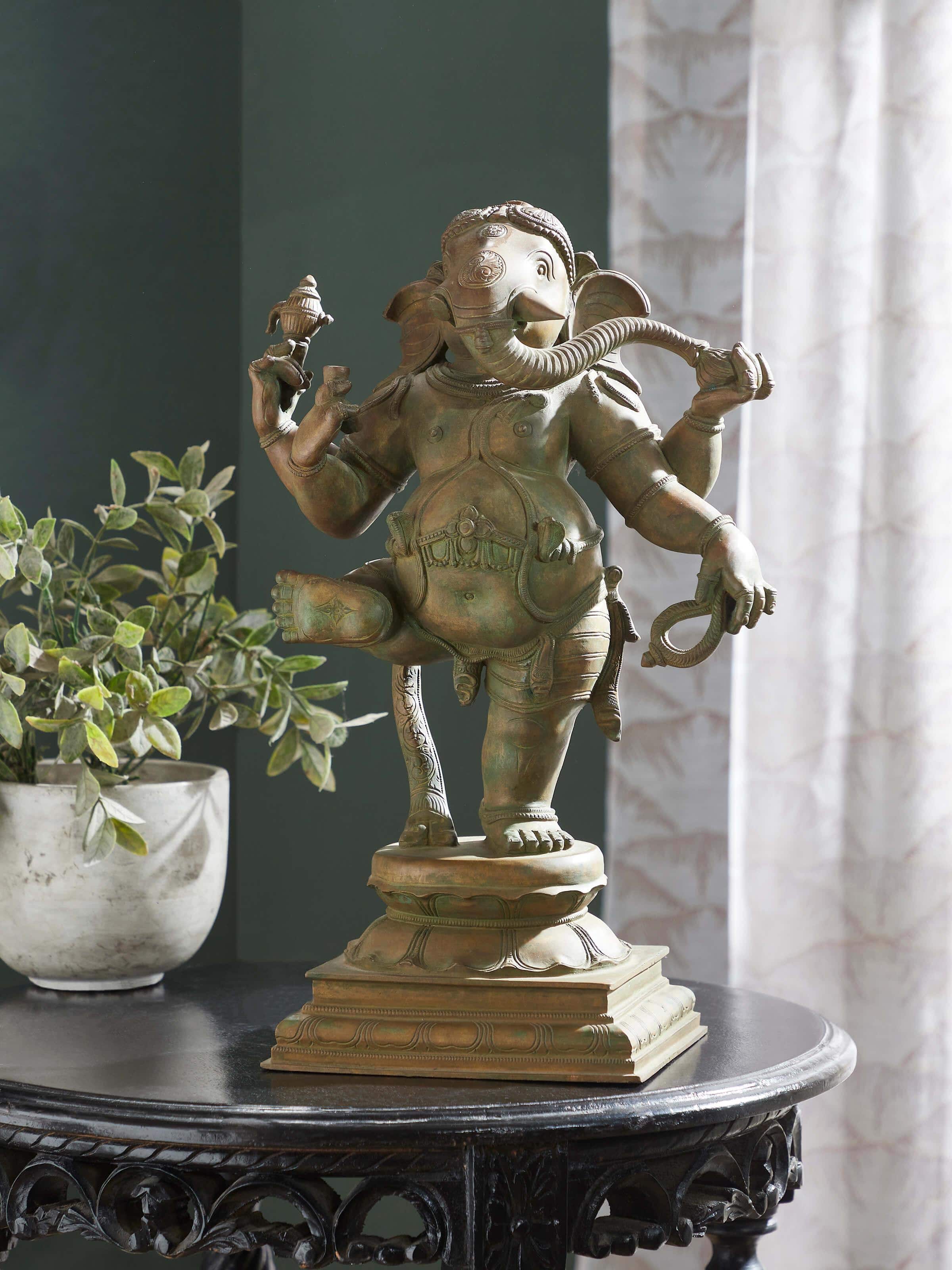 Side view of Mystical Bronze Casting Ganesha Idol showcasing intricate details and artistic bronze finish.