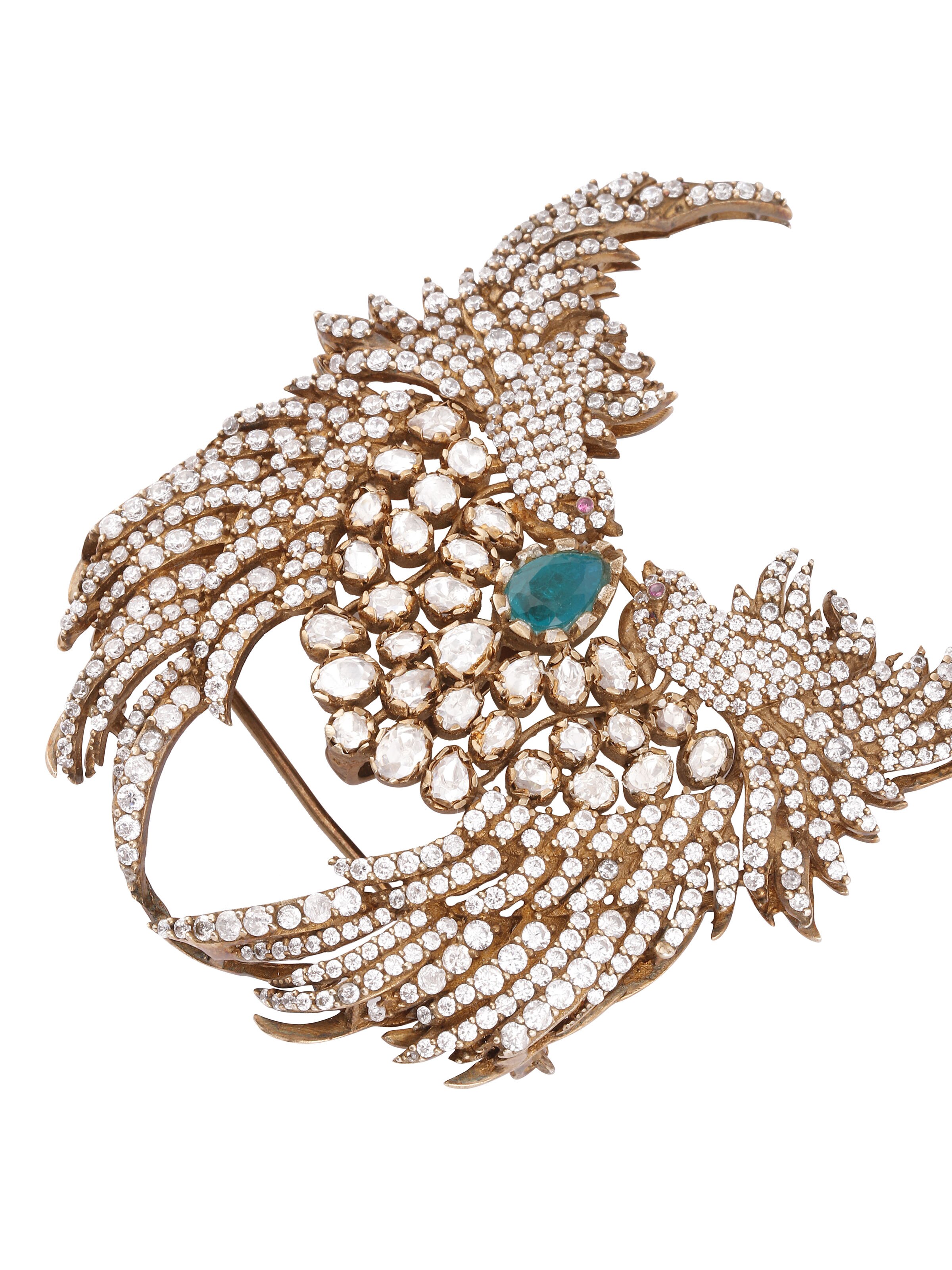 top view of silver smithing yellow gold brooch pin