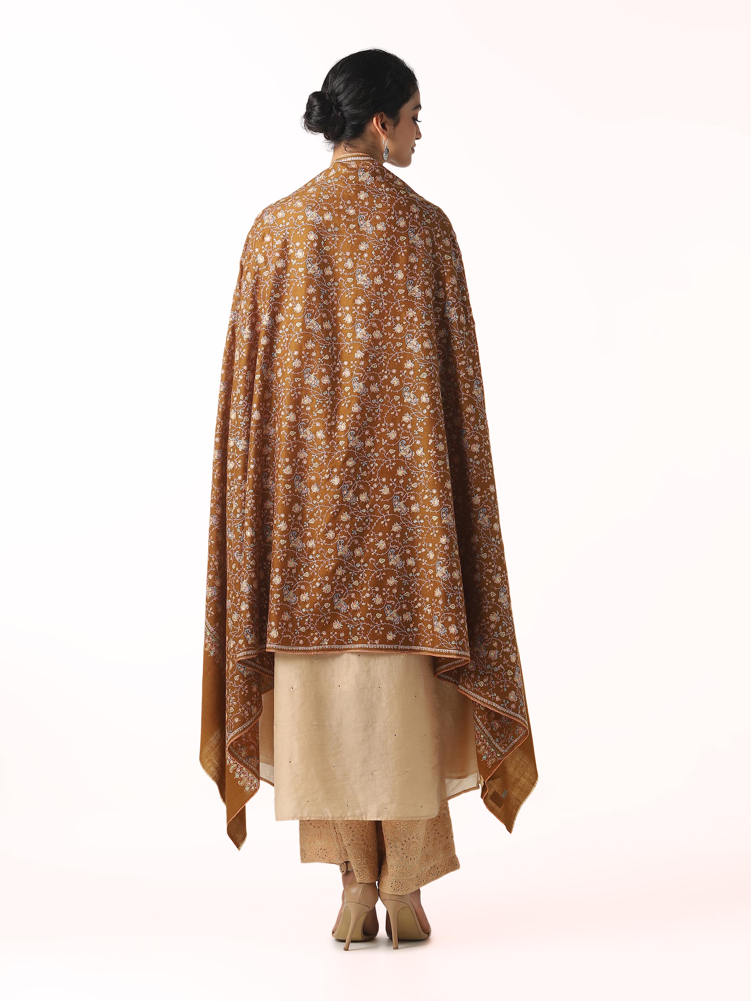Back view of brown neemjali sozni embroidered shawl displaying complete design
