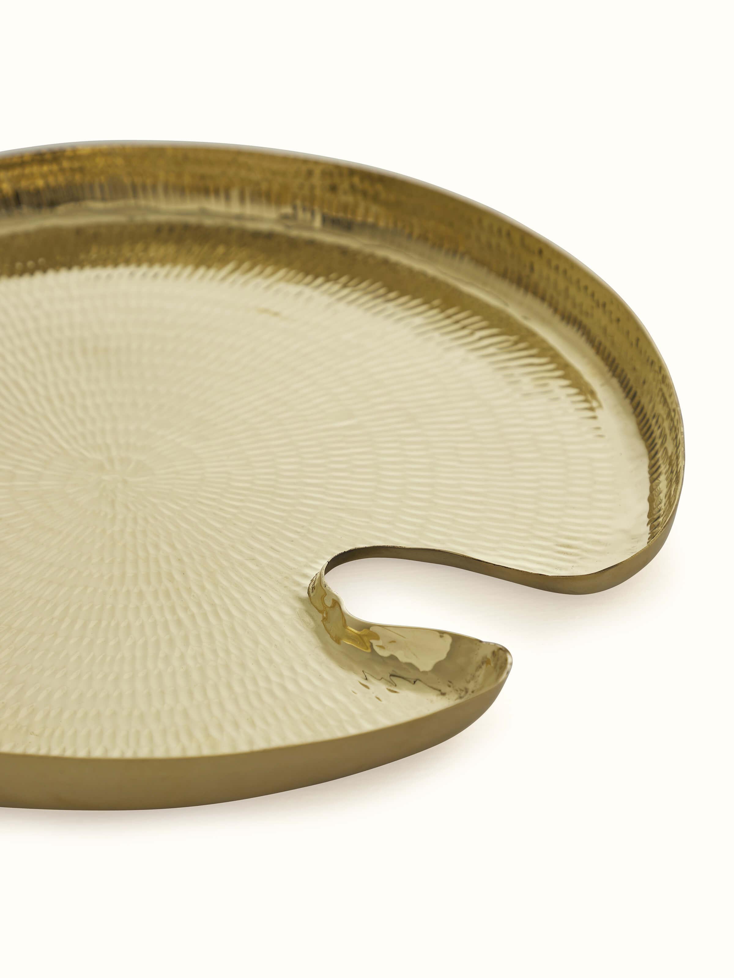 Angled view of Polished Brass Pooja Thali, showcasing the fine details and polished brass finish.