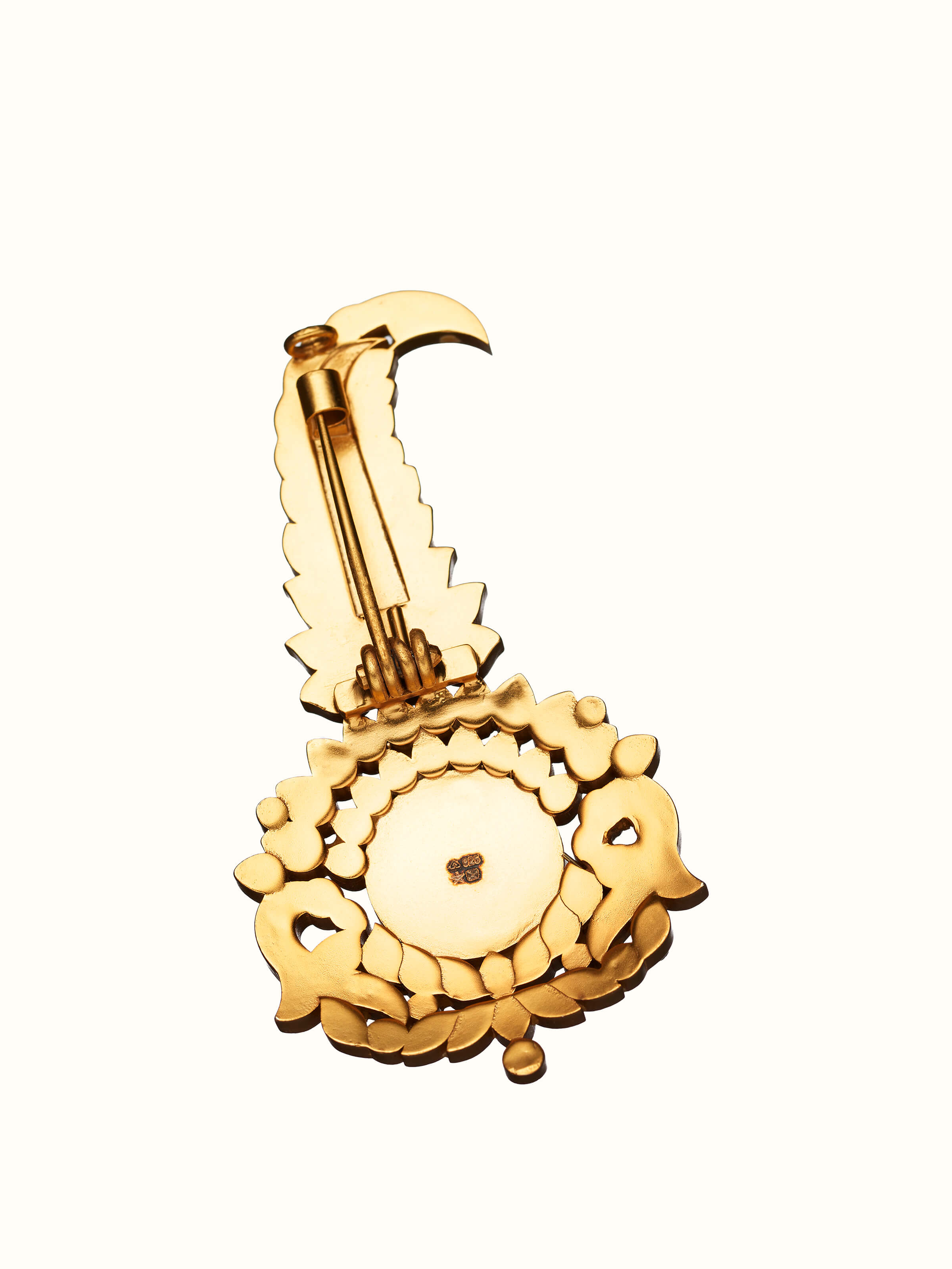 back view of silver smithing yellow gold brooch pin with pin clasp