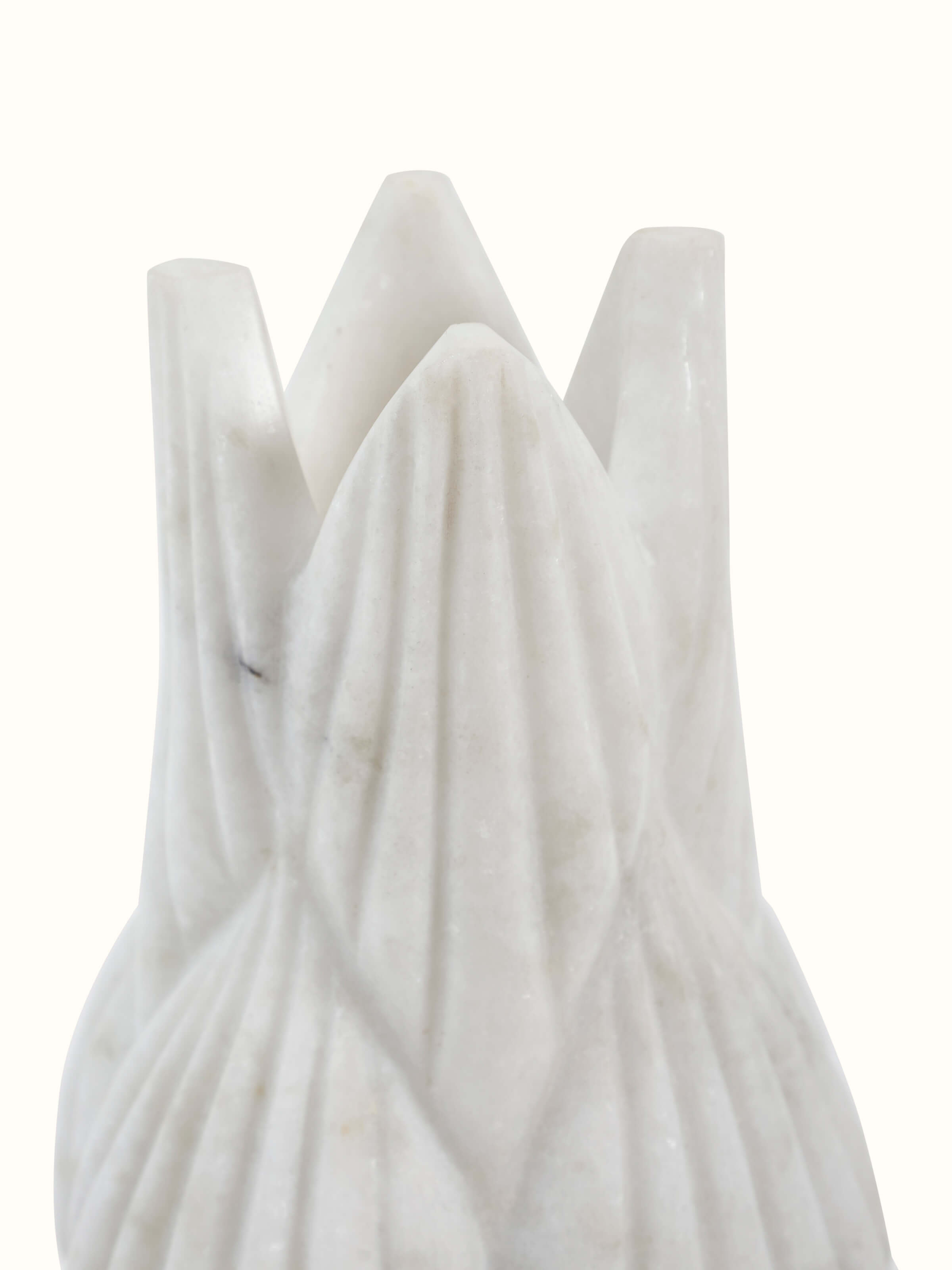 Close-up detail of marble floor vase craftsmanship