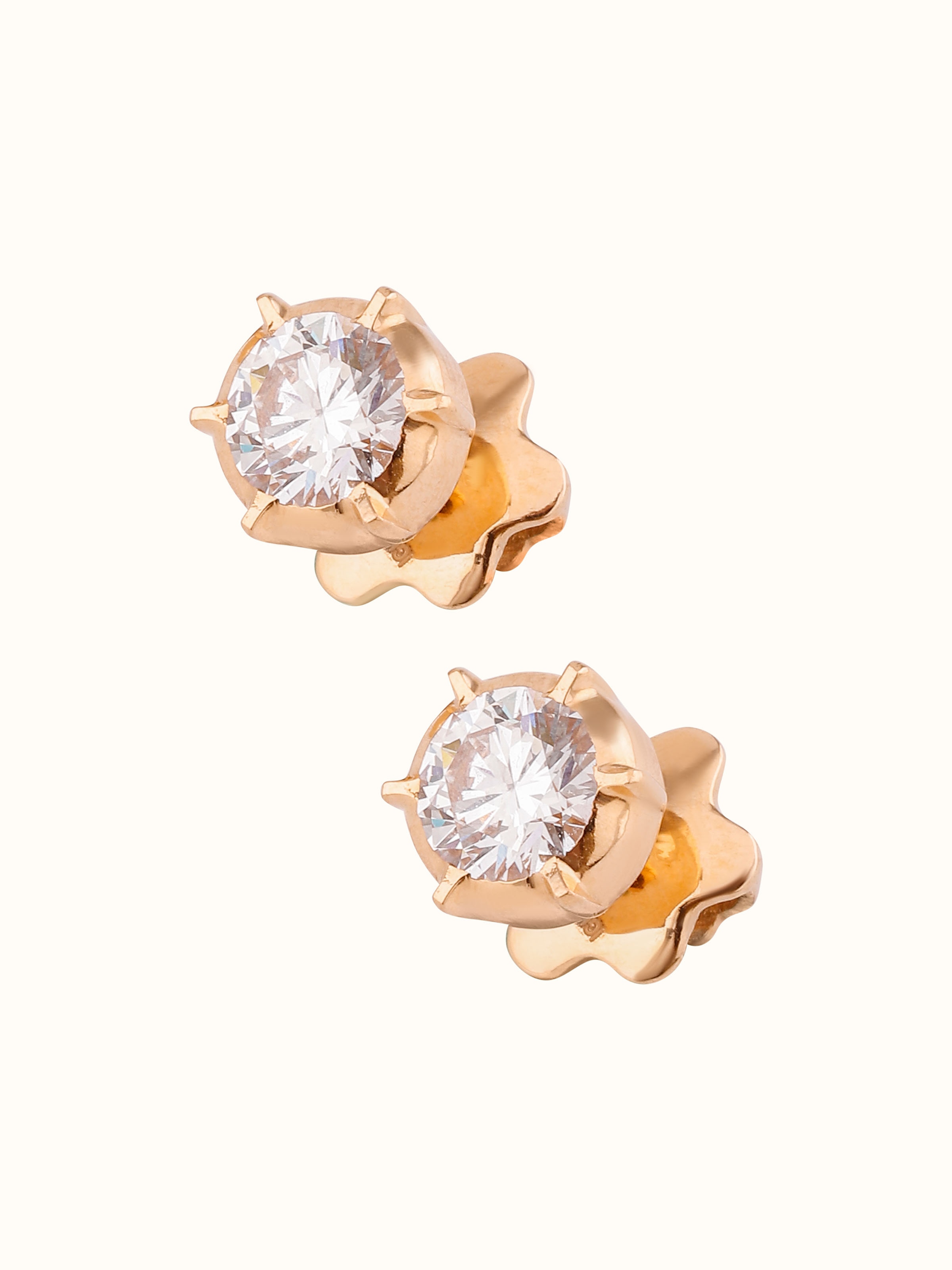 Overhead shot showcasing the studs’ symmetry and timeless 22 Karat gold appeal