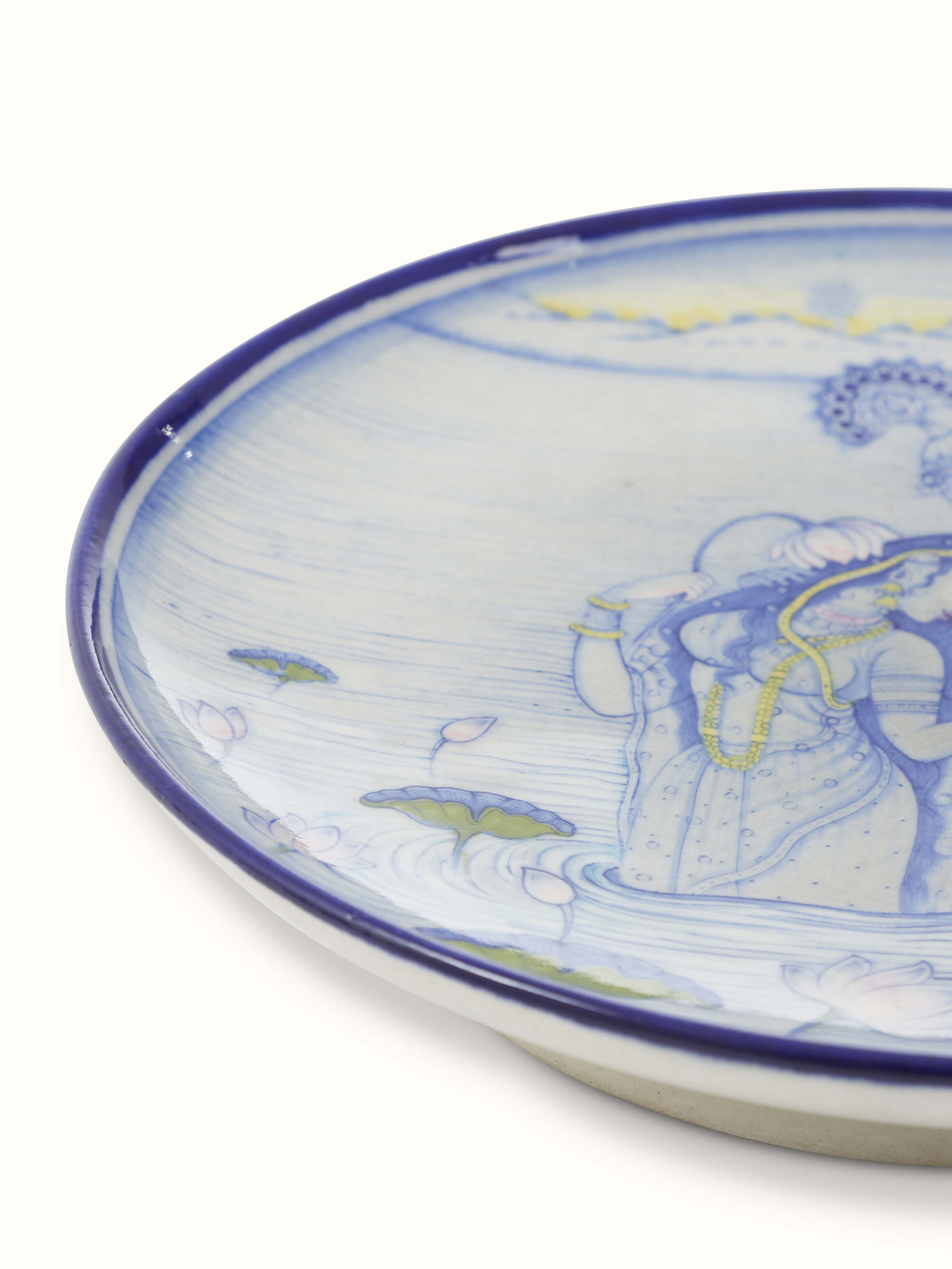 Detailed view of Blue Pottery Lovers Display Plate, focusing on the unique flower and lovers motif painted on the plate.