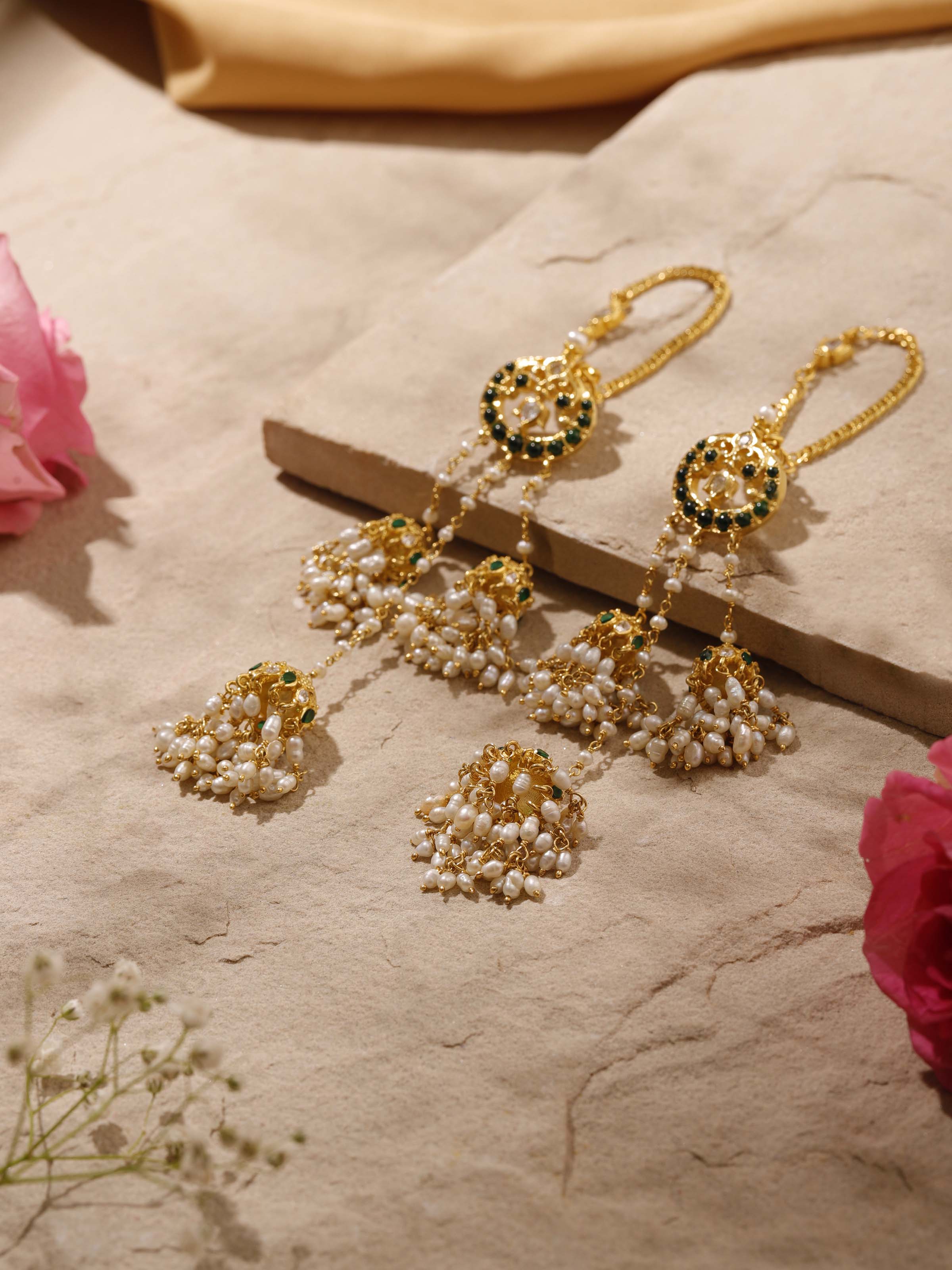 Overhead view displaying elegant shape and craftsmanship of Guttapusalu silver drops