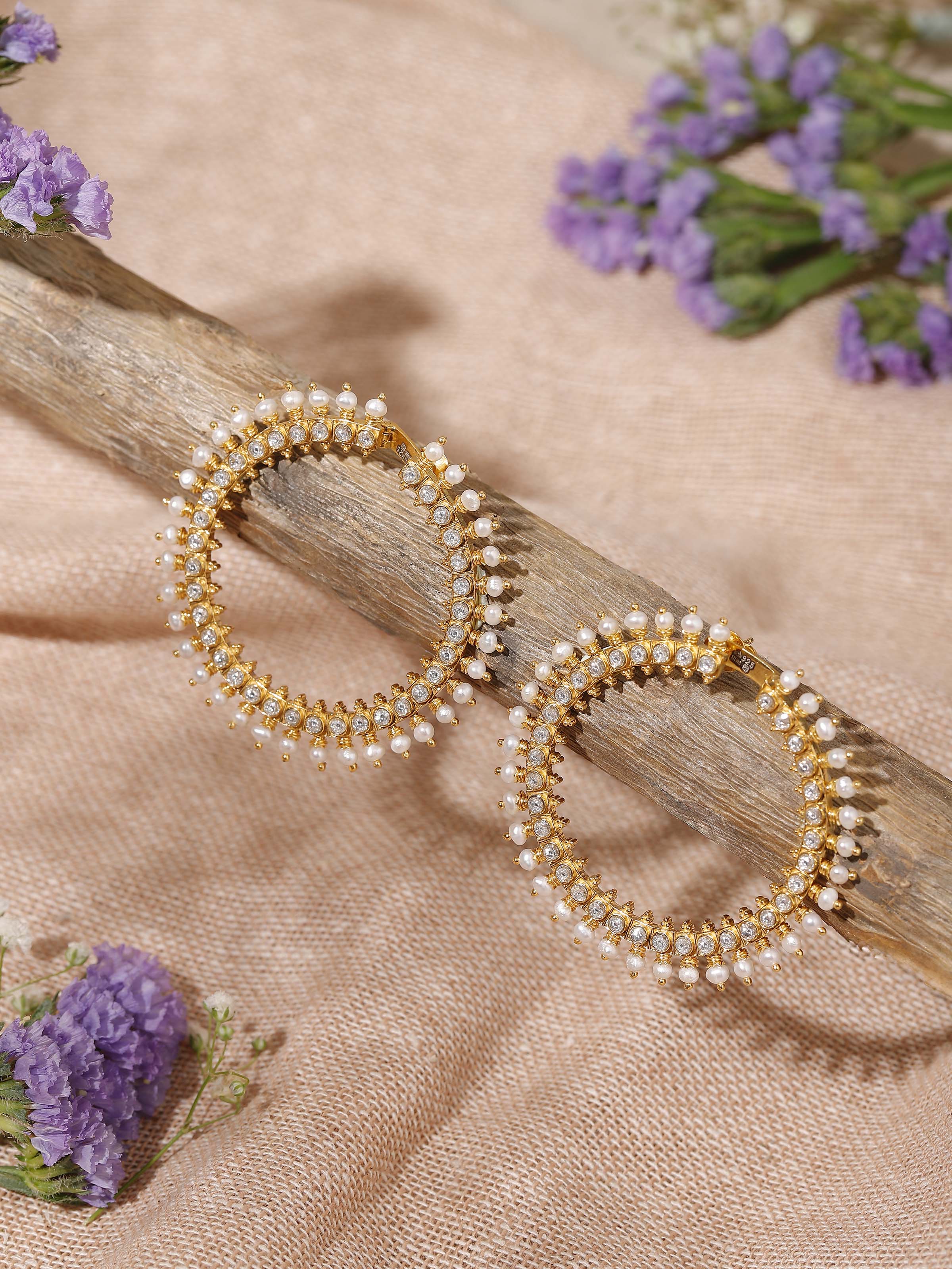 Lifestyle view of Guttapusalu Silver Hoop Earrings paired with ethnic hairstyle.