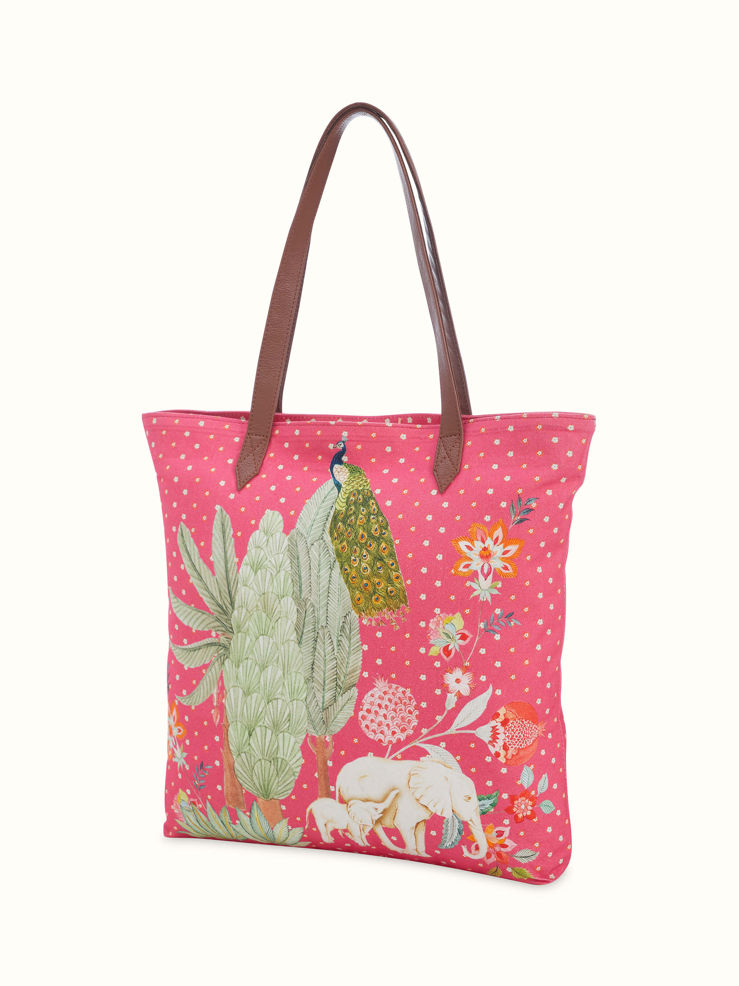 Angled view of tote bag printed with design inspired by miniature artwork highlighting overall shape