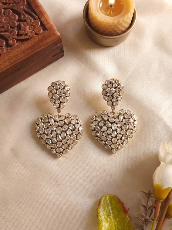 Lifestyle view of dank polki 14 karat gold studs