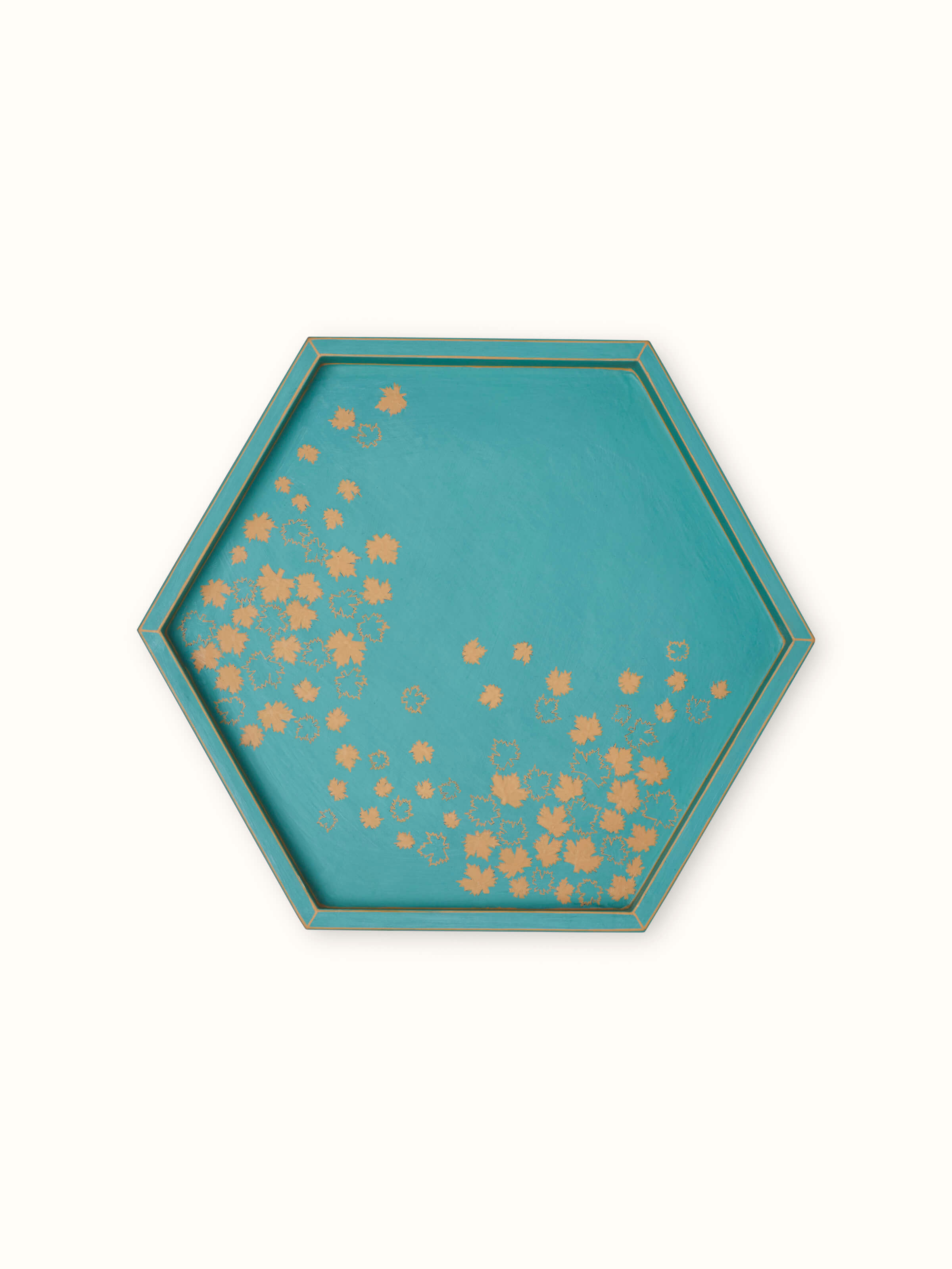 Close-up of papier-mâché decorative tray, focusing on the intricate details and vibrant colors.