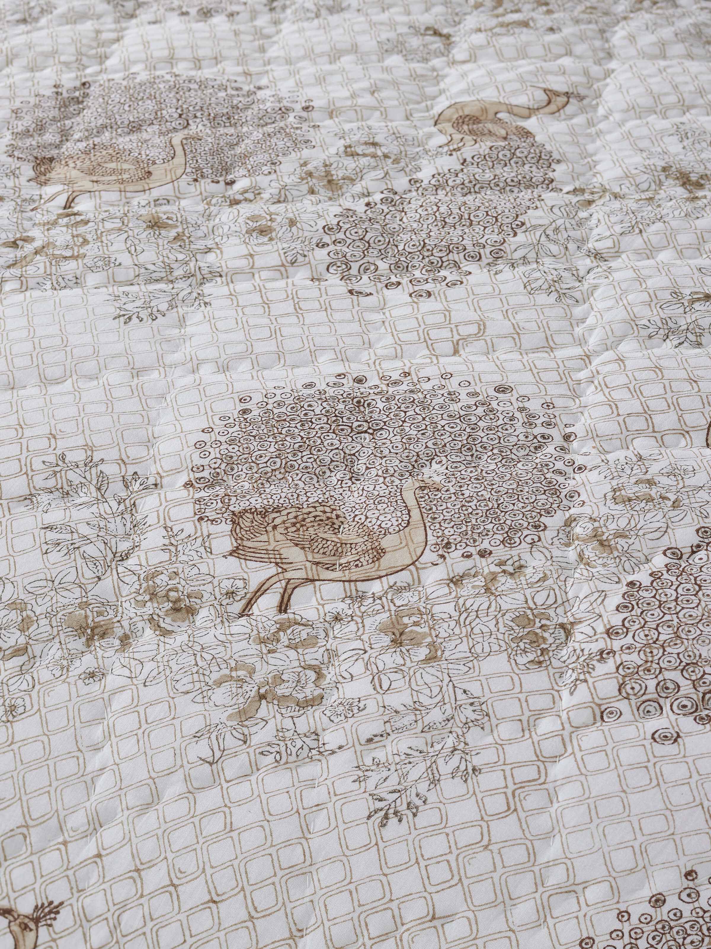 Another angle of Shivranjini beige floral cotton Sanganeri block printed double quilt