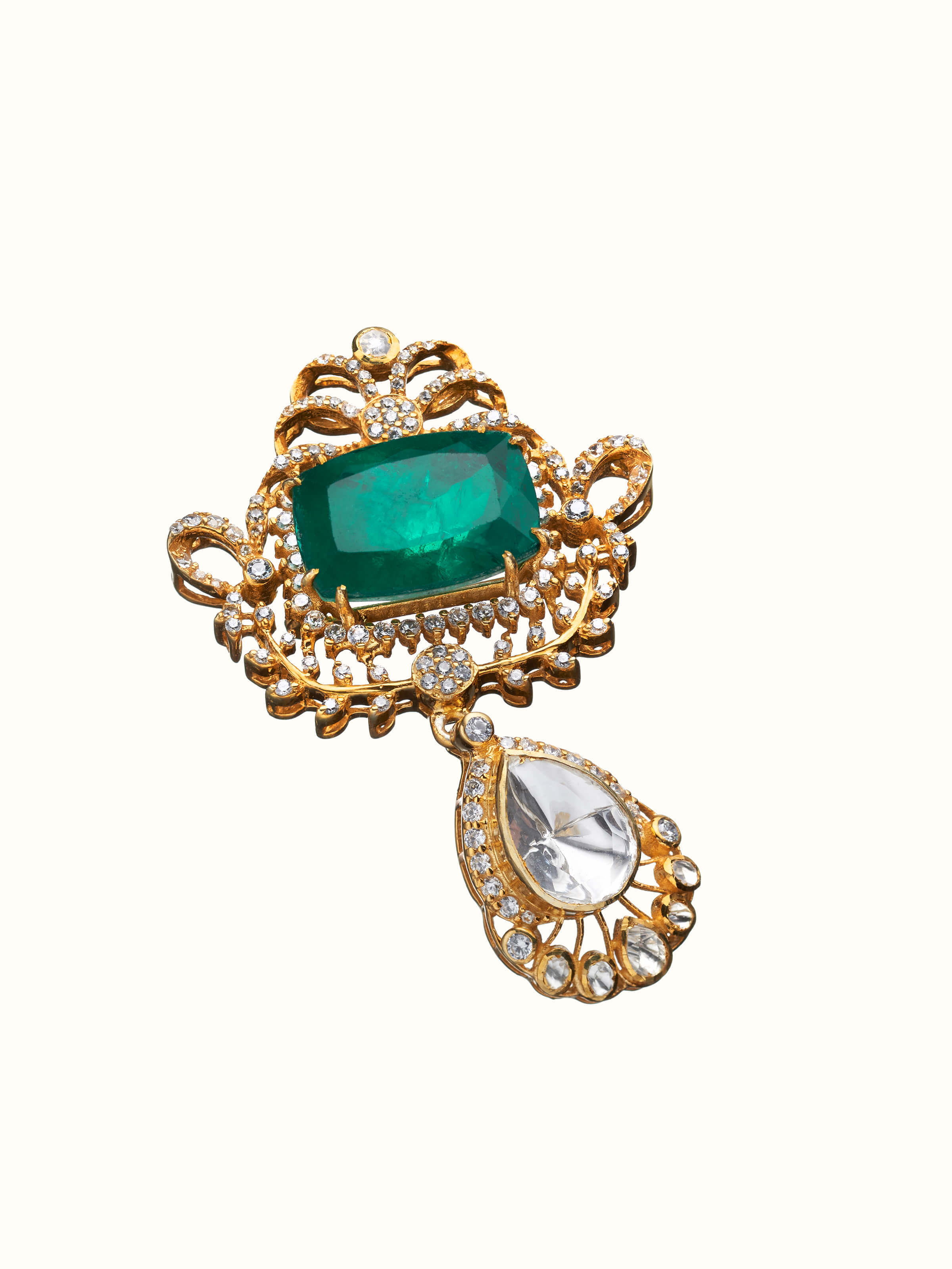 angled view of silver smithing yellow gold brooch pin