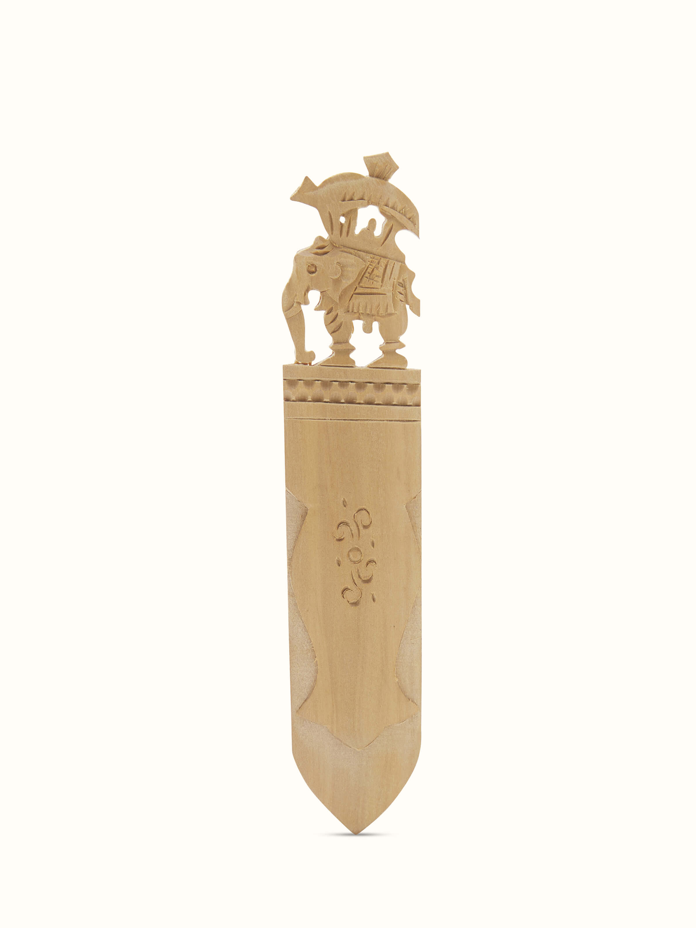 Overhead view of Carved Sandalwood Elephant Bookmark by Swadesh showcasing the intricate detailing of the elephant carving and design.