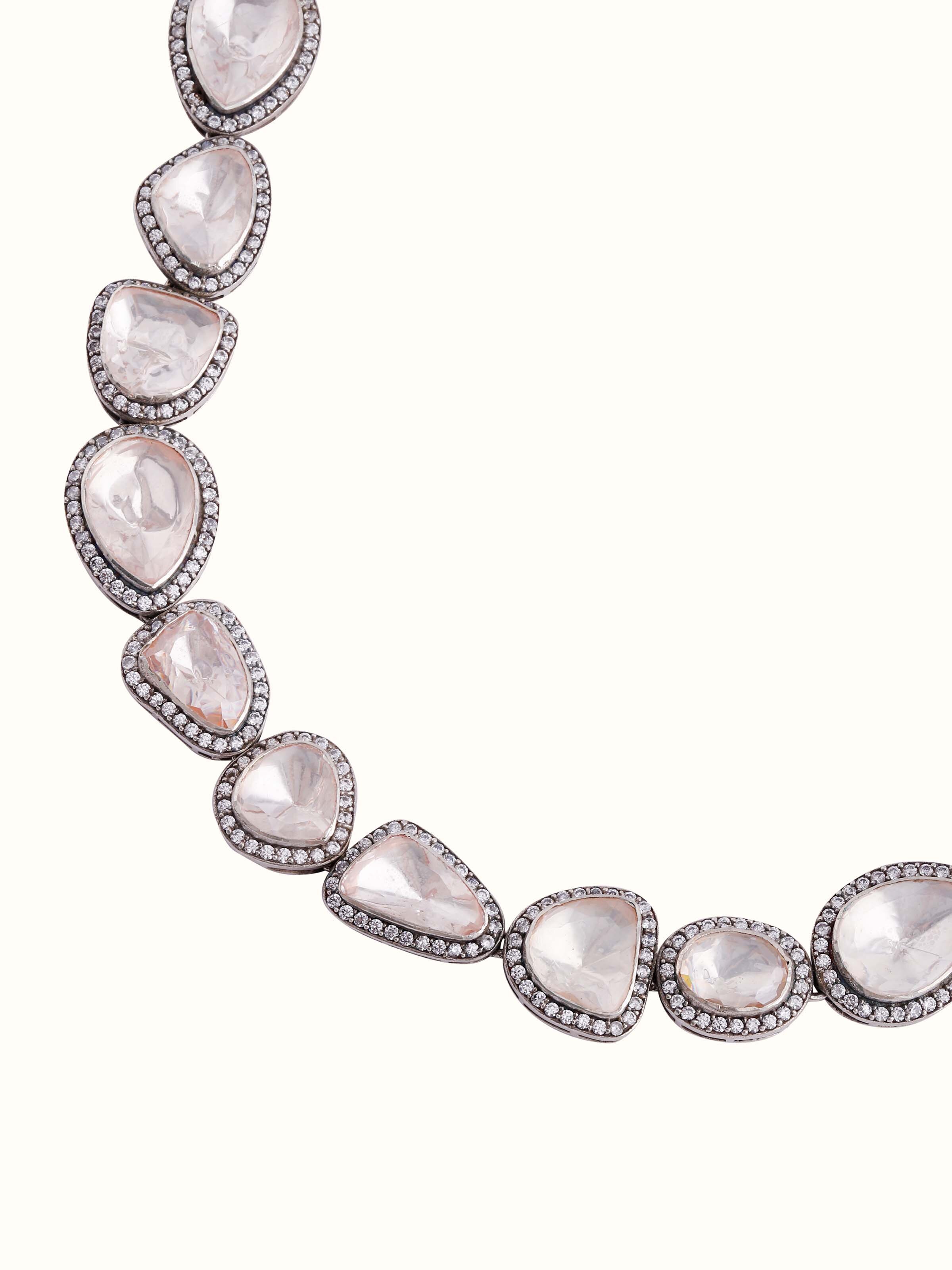 Side close-up of Silver Smithing Collar Necklace by Swadesh emphasizing the sleek collar shape and fine detailing in silver