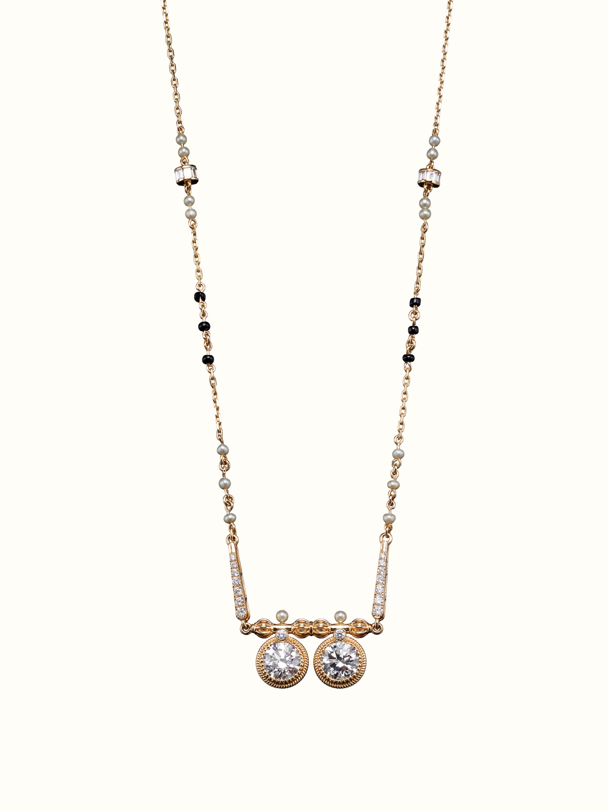 front view of open setting 14 karat gold mangalsutra with minimalist pendant