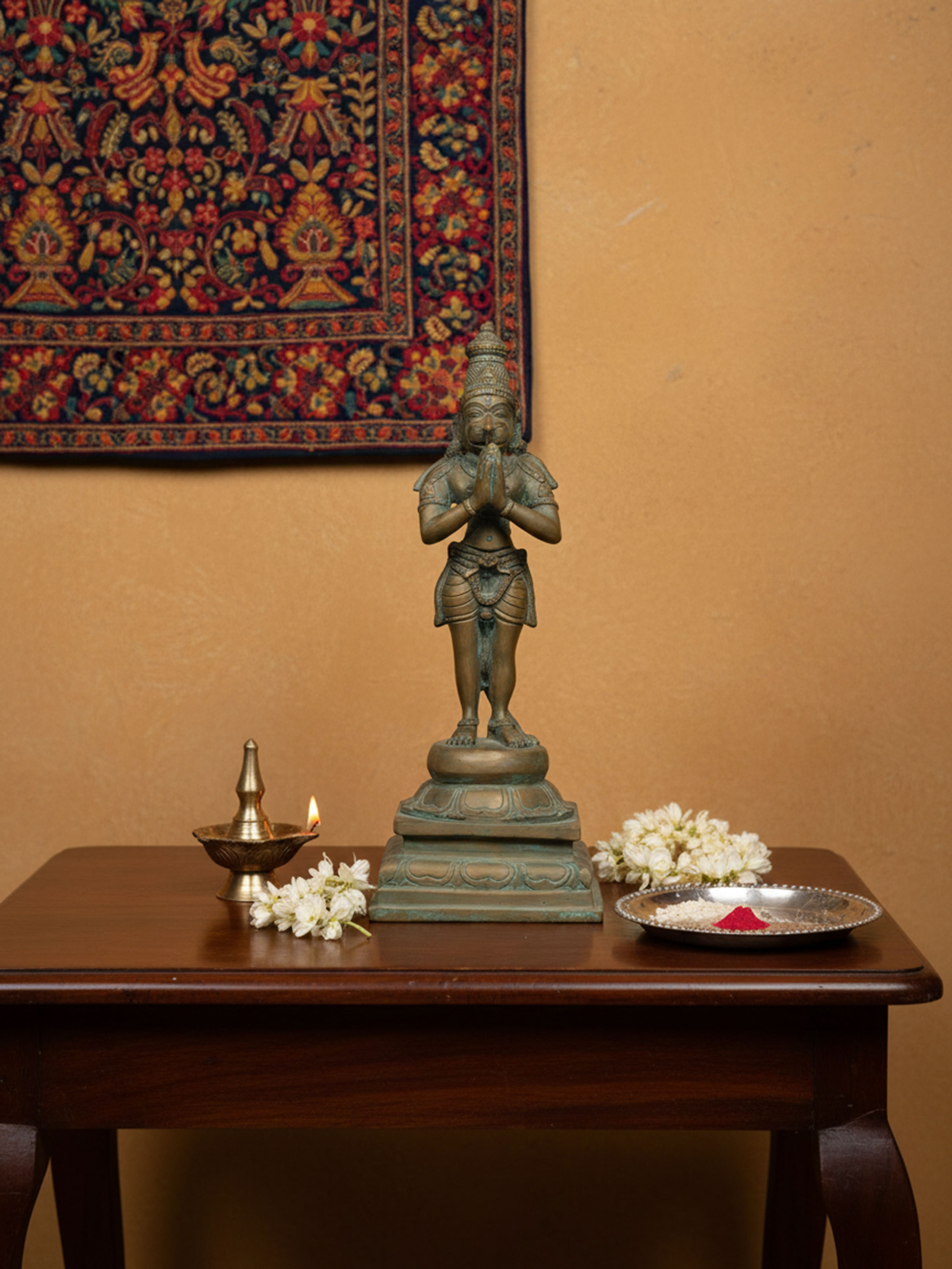Handcrafted bronze Hanuman idol – side view