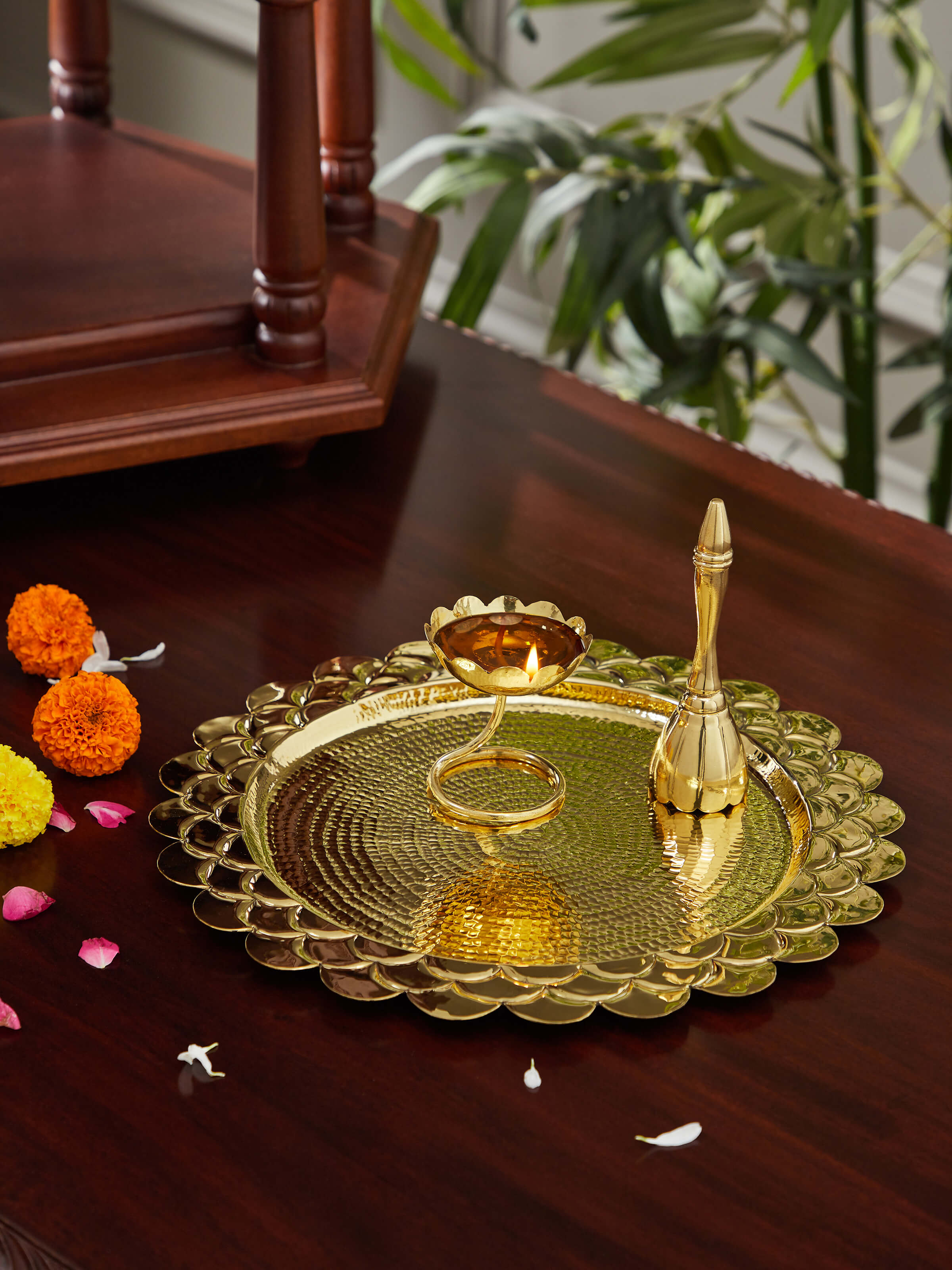 Side view of Polished Brass Pooja Thali Set (3 Pcs) highlighting the elegant curve and fine brasswork.