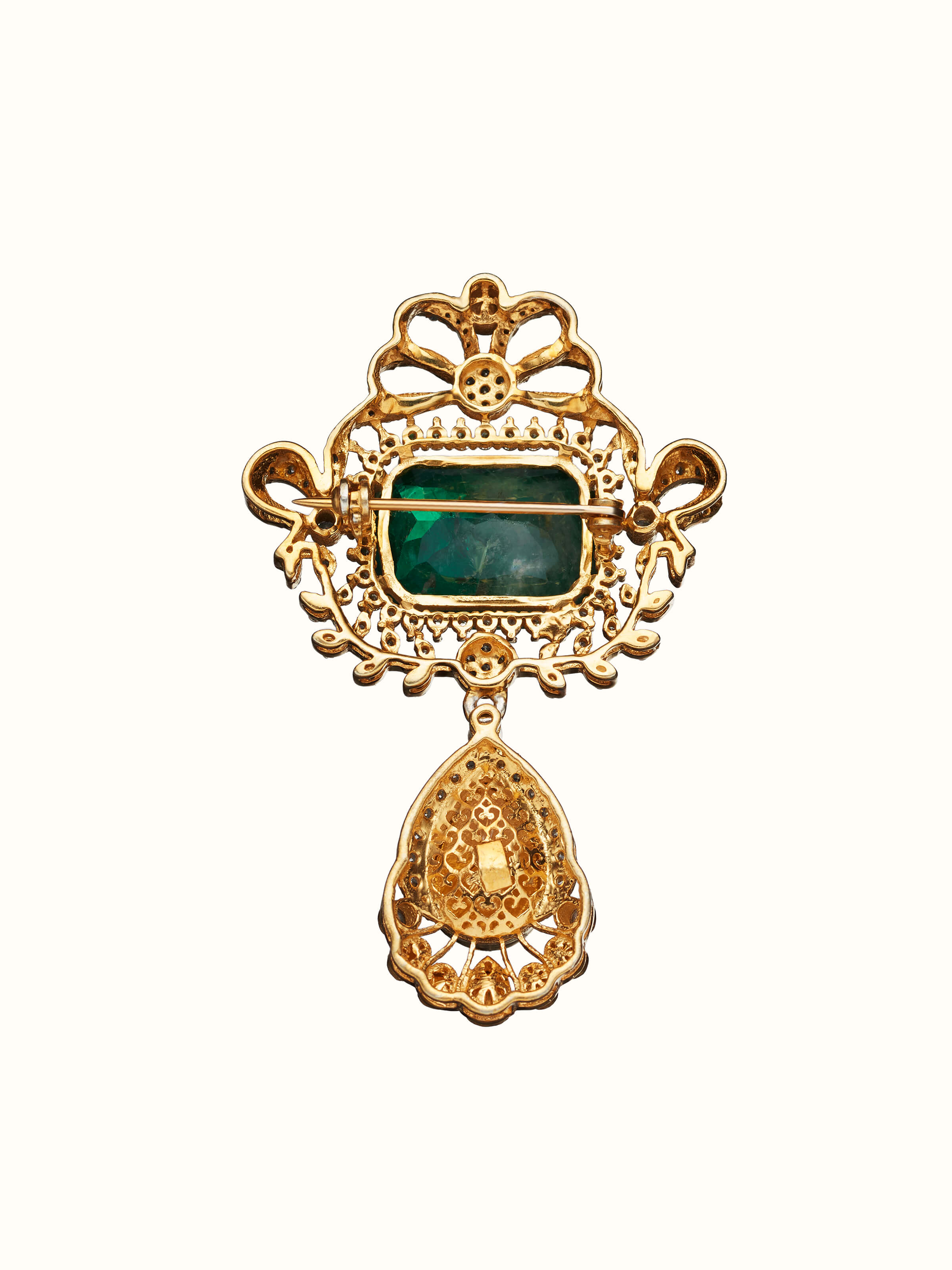 back view of silver smithing yellow gold brooch pin with pin clasp