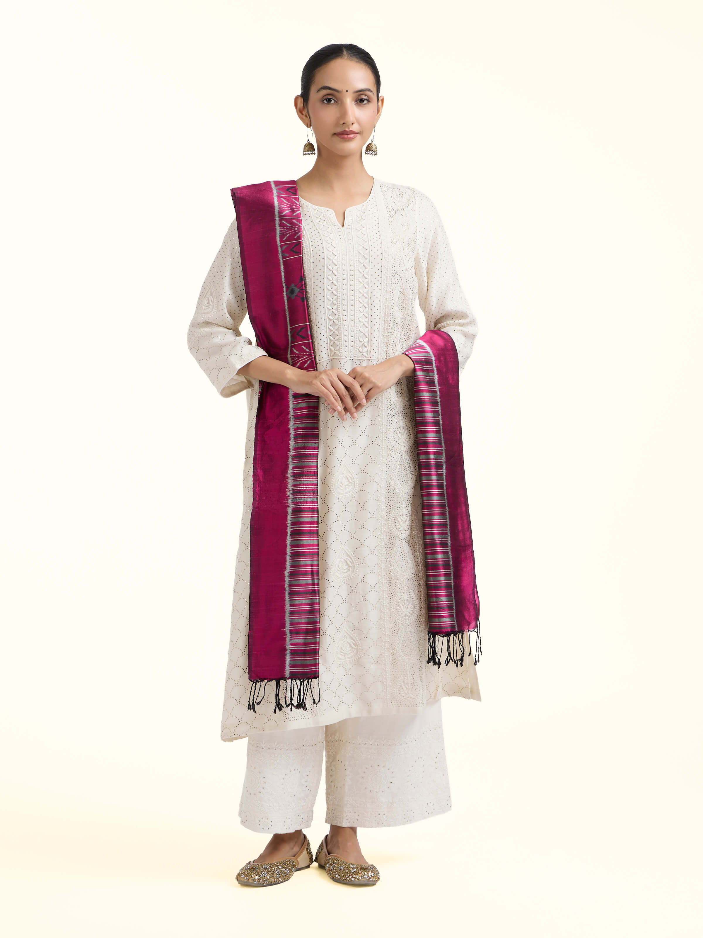 Front view of pink silk Odisha ikat dupatta with traditional motifs