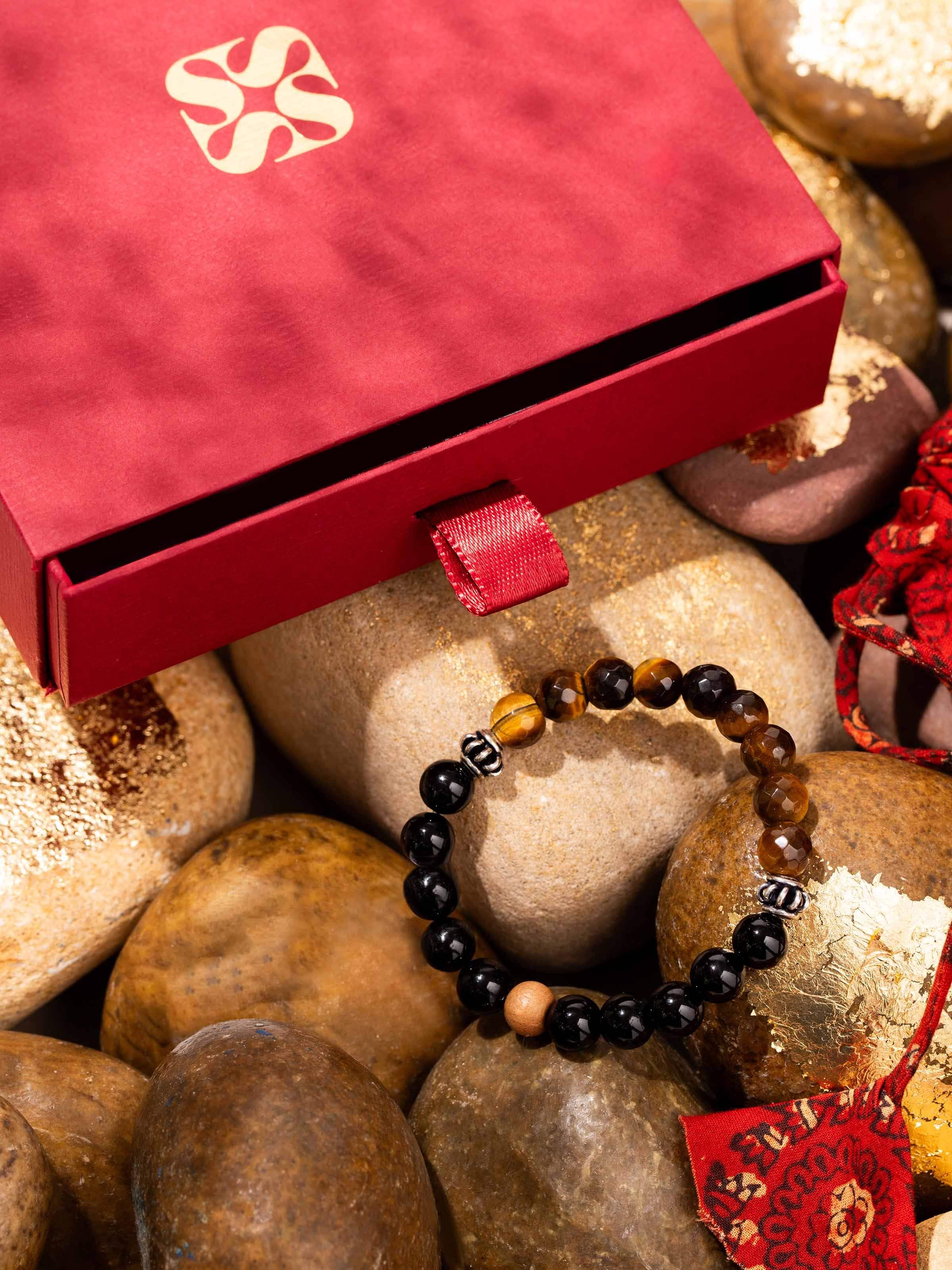Lifestyle close-up of Tiger Eye, Black Onyx & Moonstone Bracelet showing gemstone shine and modern appeal