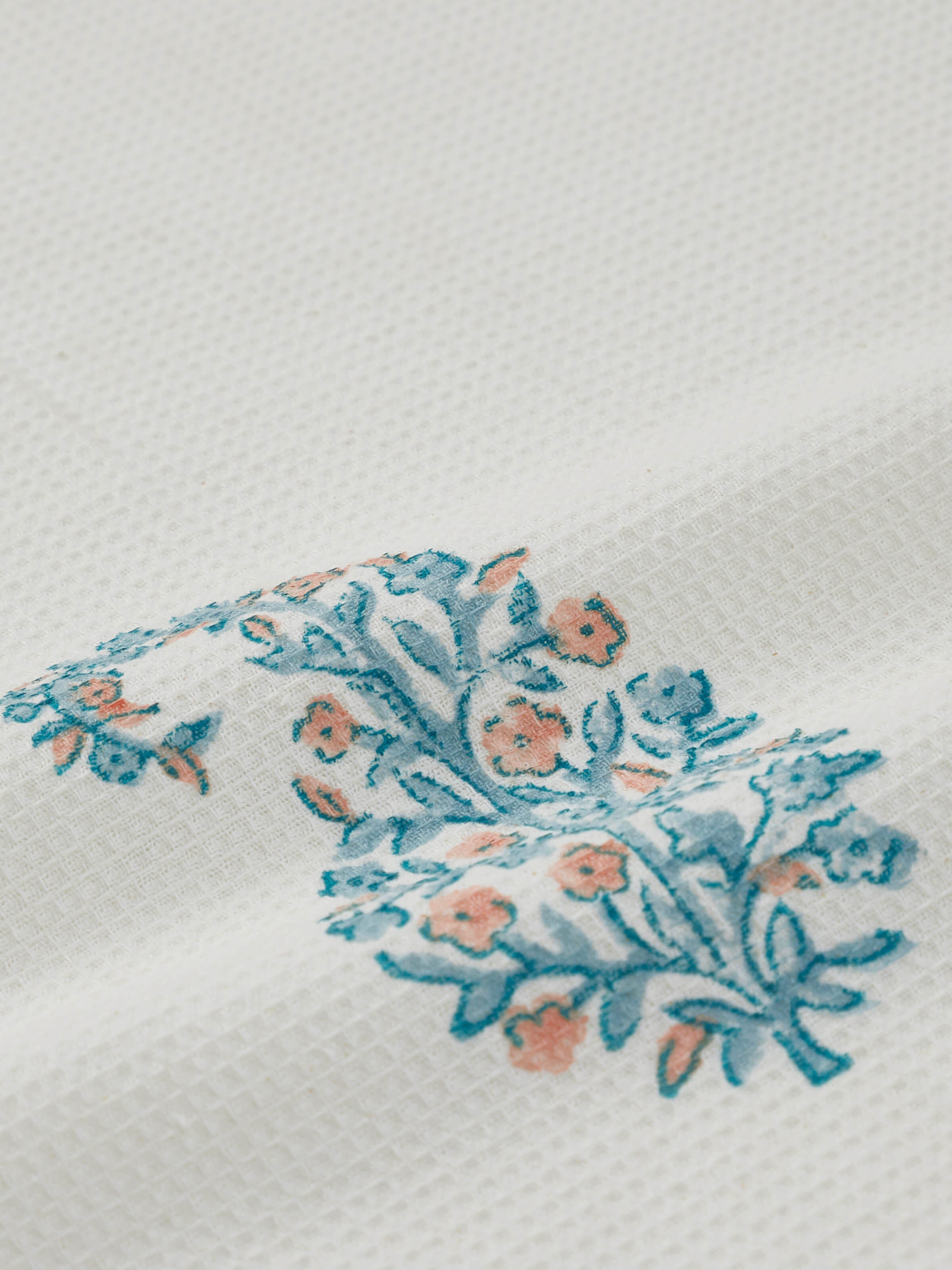 Close-up of Ambi buta blue floral cotton Sanganeri block printed face towels highlighting the intricate block print details