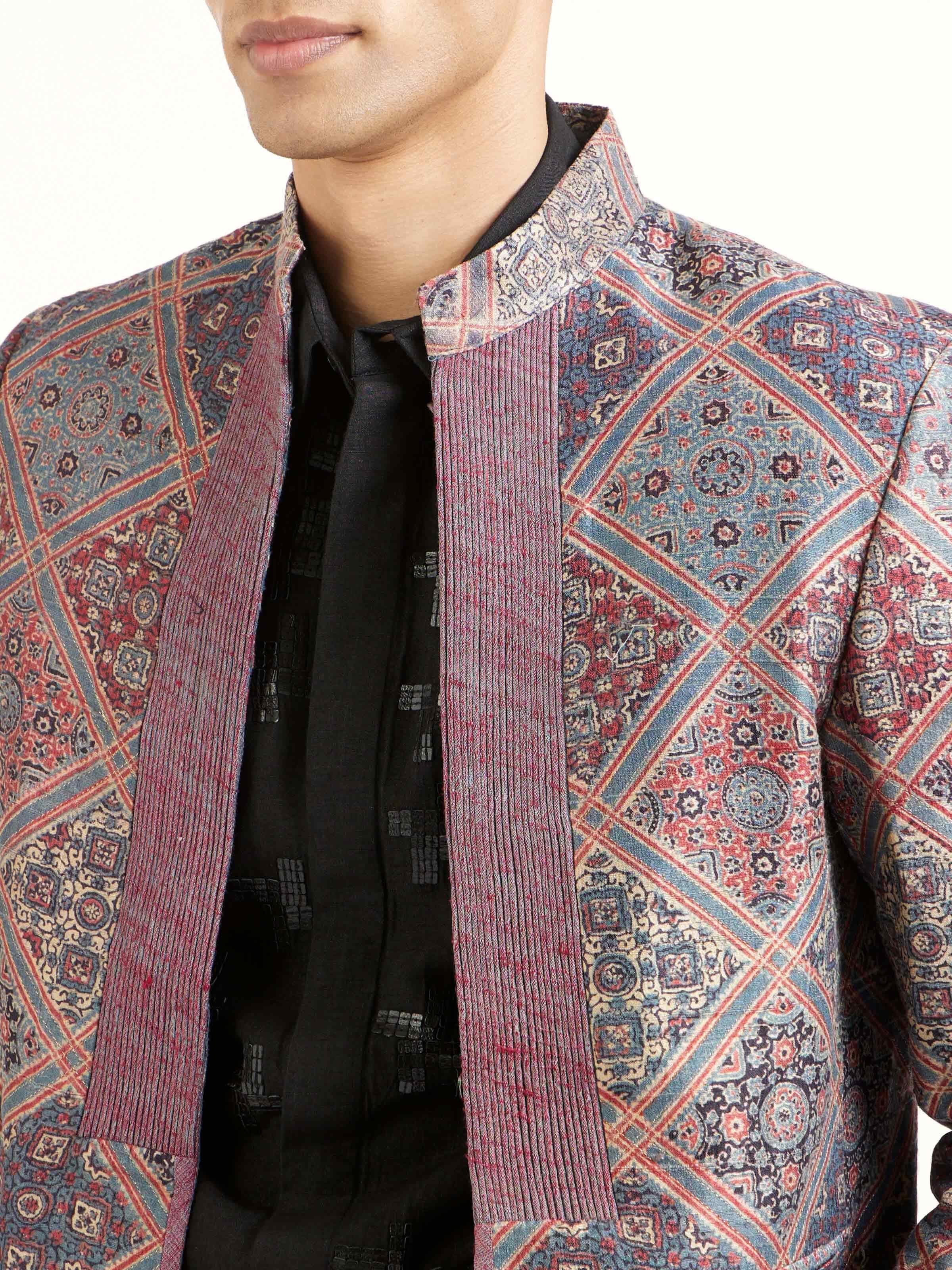 Detail view of indigo silk ajrakh block printed jacket showing fabric texture and print clarity