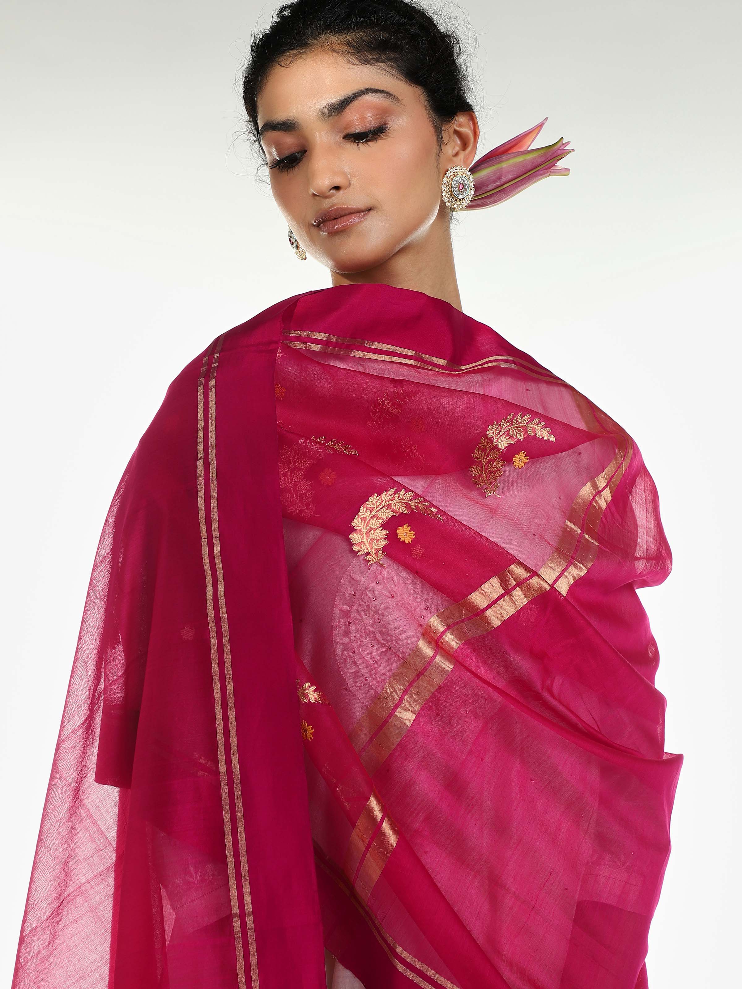 Alternate side view of fuschia cotton silk Chanderi dupatta emphasizing subtle sheen
