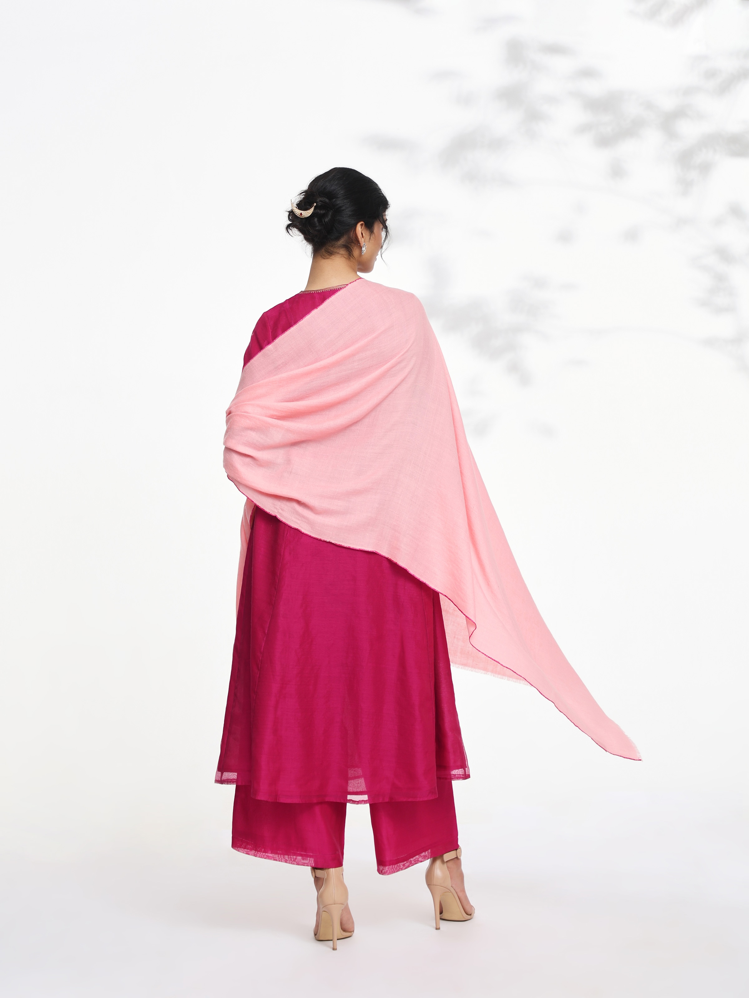 Side view of pink cashmere kaaj embroidered handwoven stole highlighting smooth drape