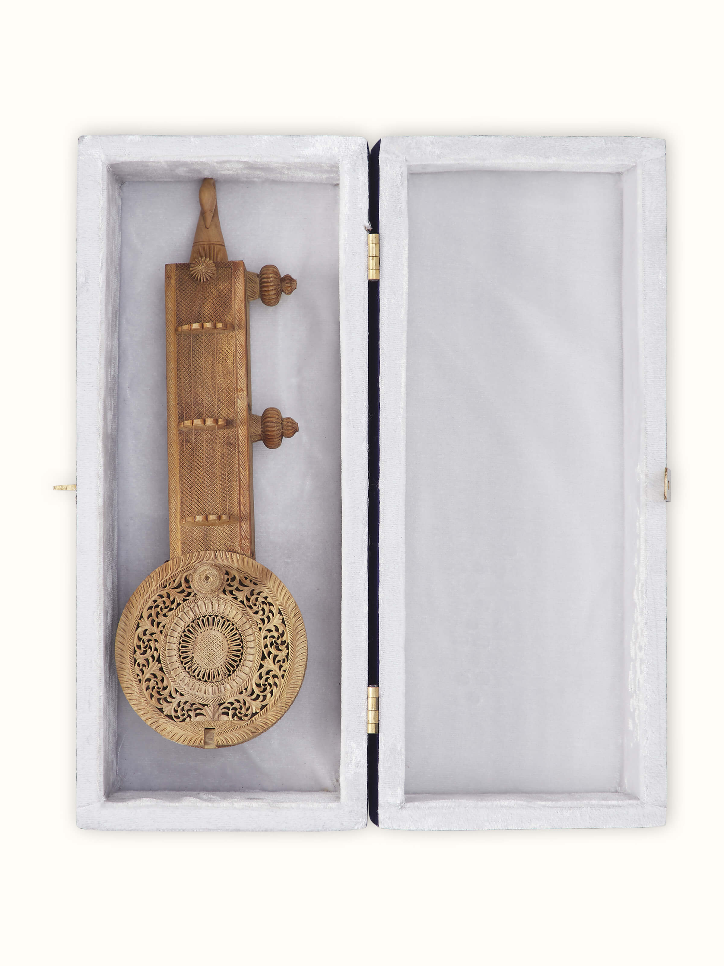 Detailed view of carved sandalwood Vandana Veena sculpture showcasing fine carving work