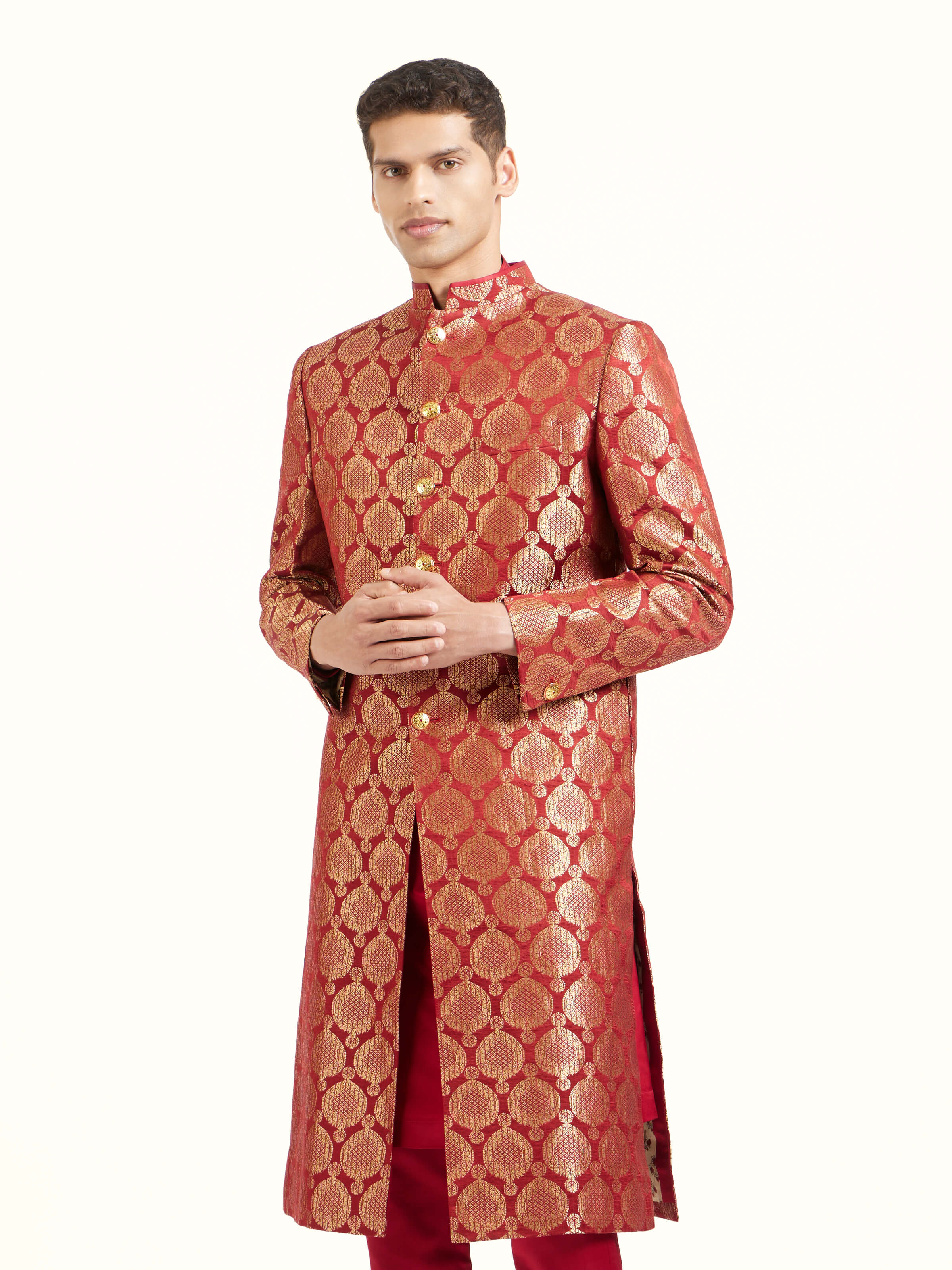 Angled view of maroon silk Banarasi butidar sherwani showcasing overall design