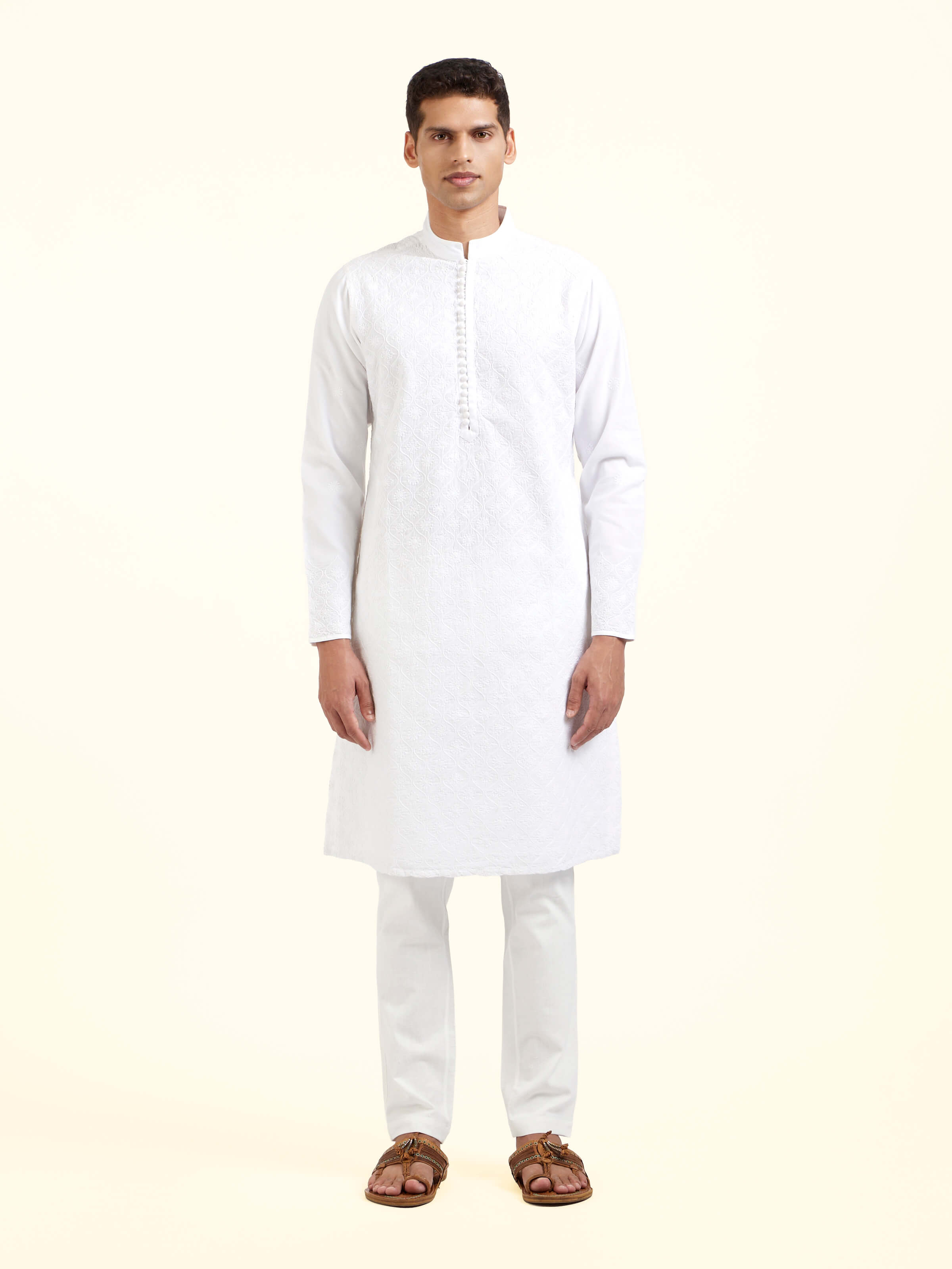 Front view of white cotton chikankari long kurta with delicate hand embroidery
