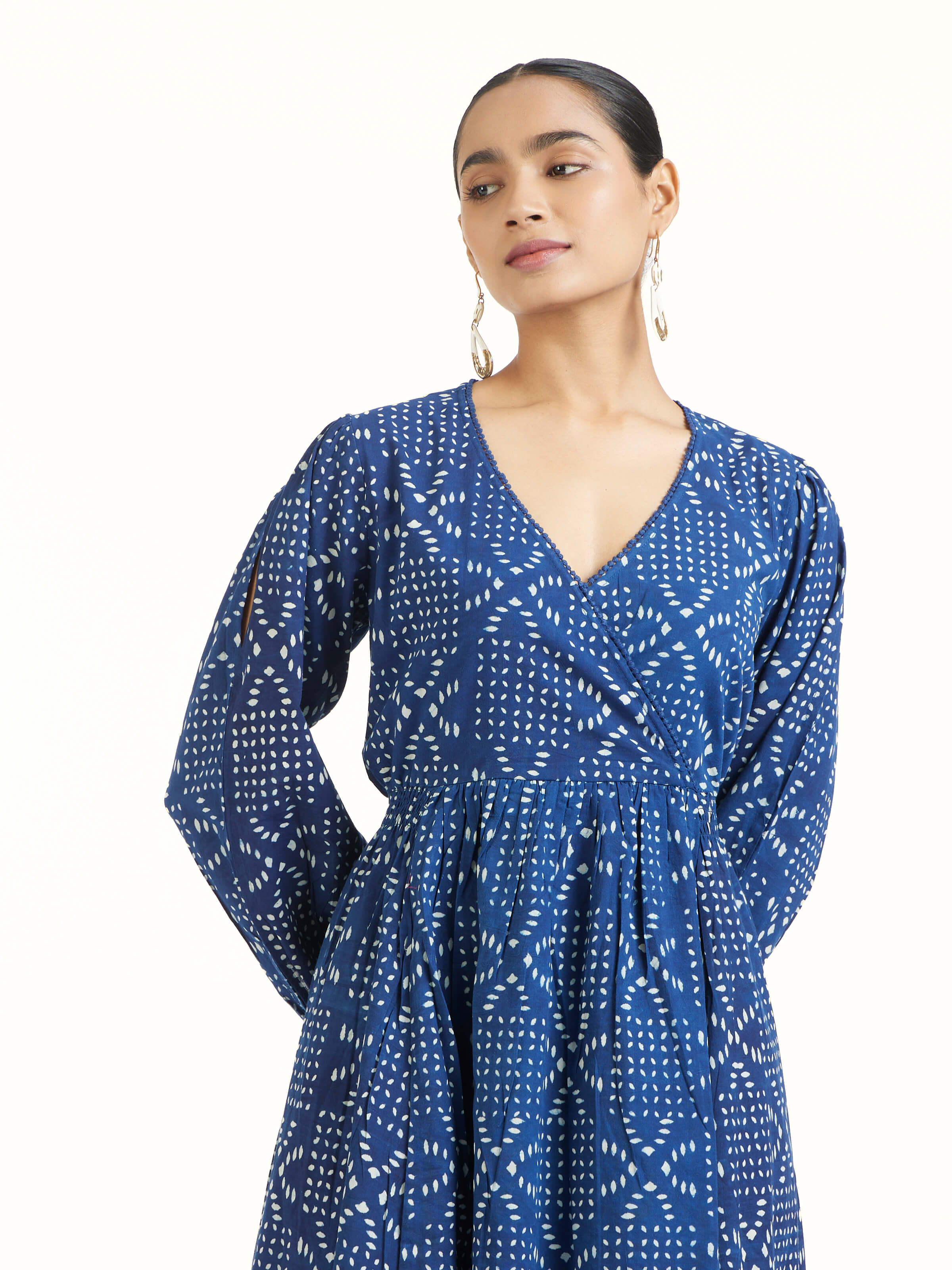 Angled view of Samika cotton dabu block printed dress highlighting dabu print technique
