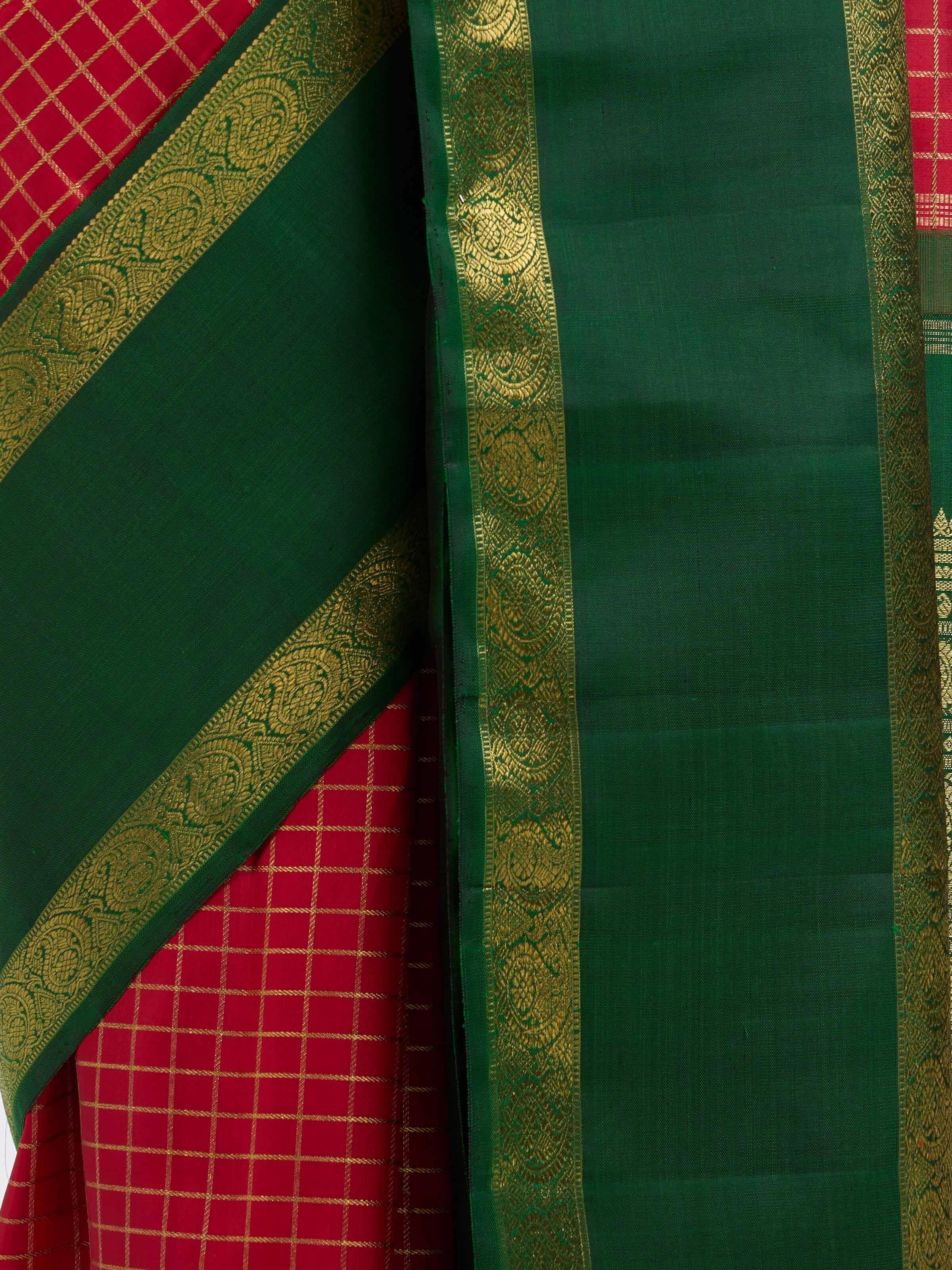 Detail view of green silk Kancheepuram saree showing silk texture and zari work