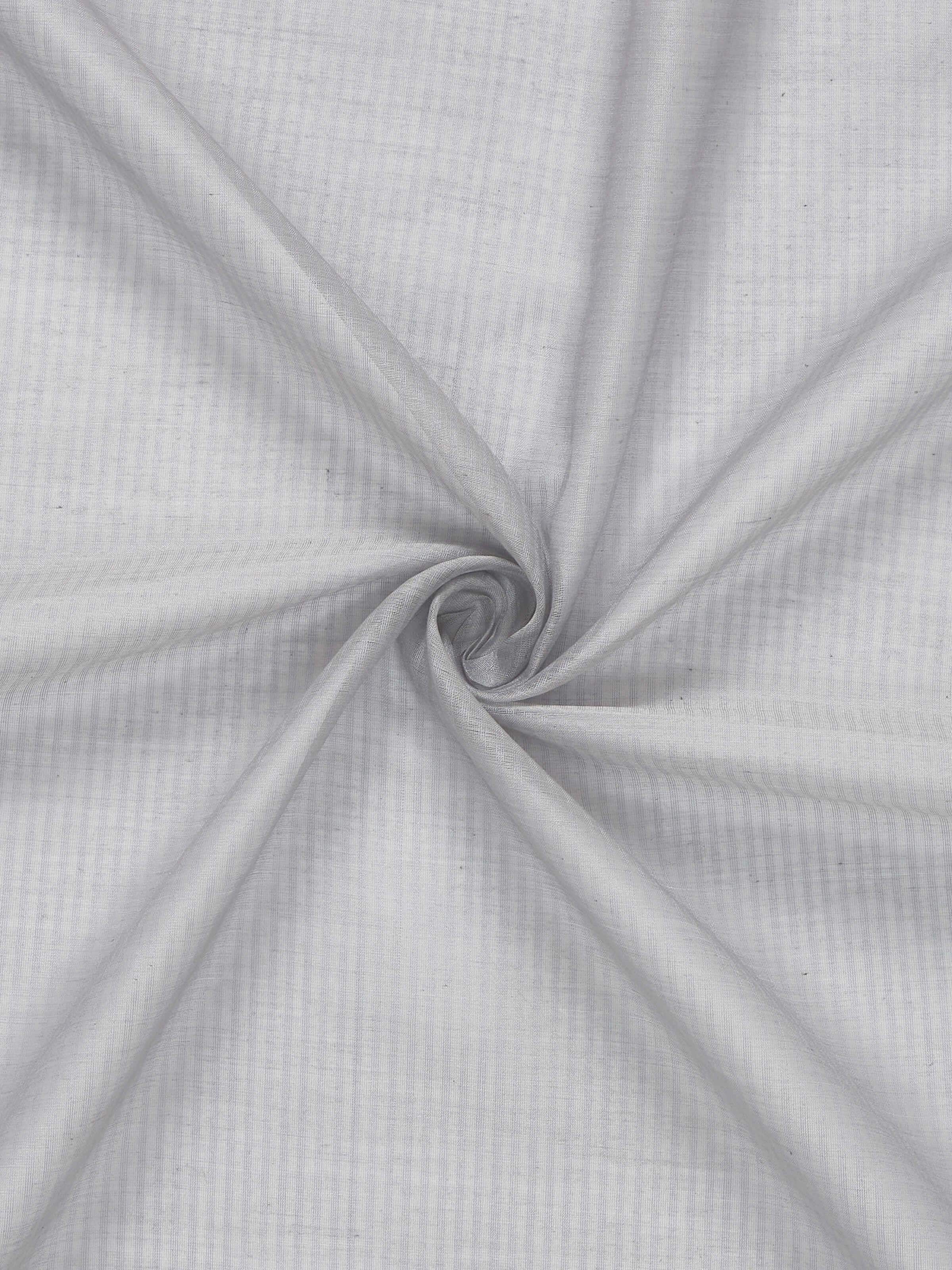 Angled view of grey Maheshwari handloom curtain, showing lightness and weave detail.