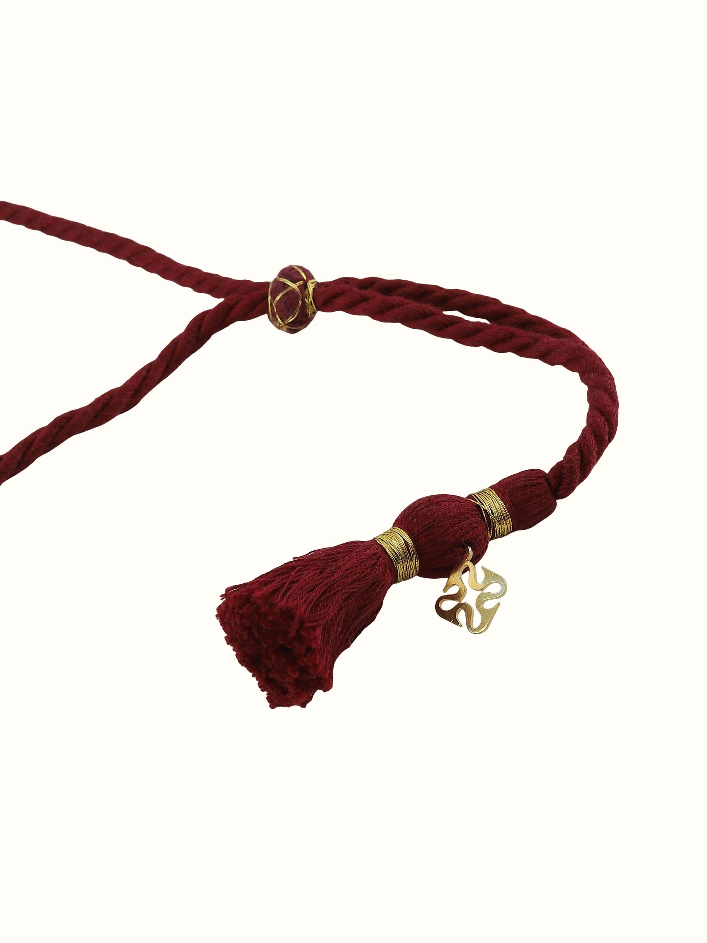 Detail view of silver necklace highlighting intricate pendant and pearl strands