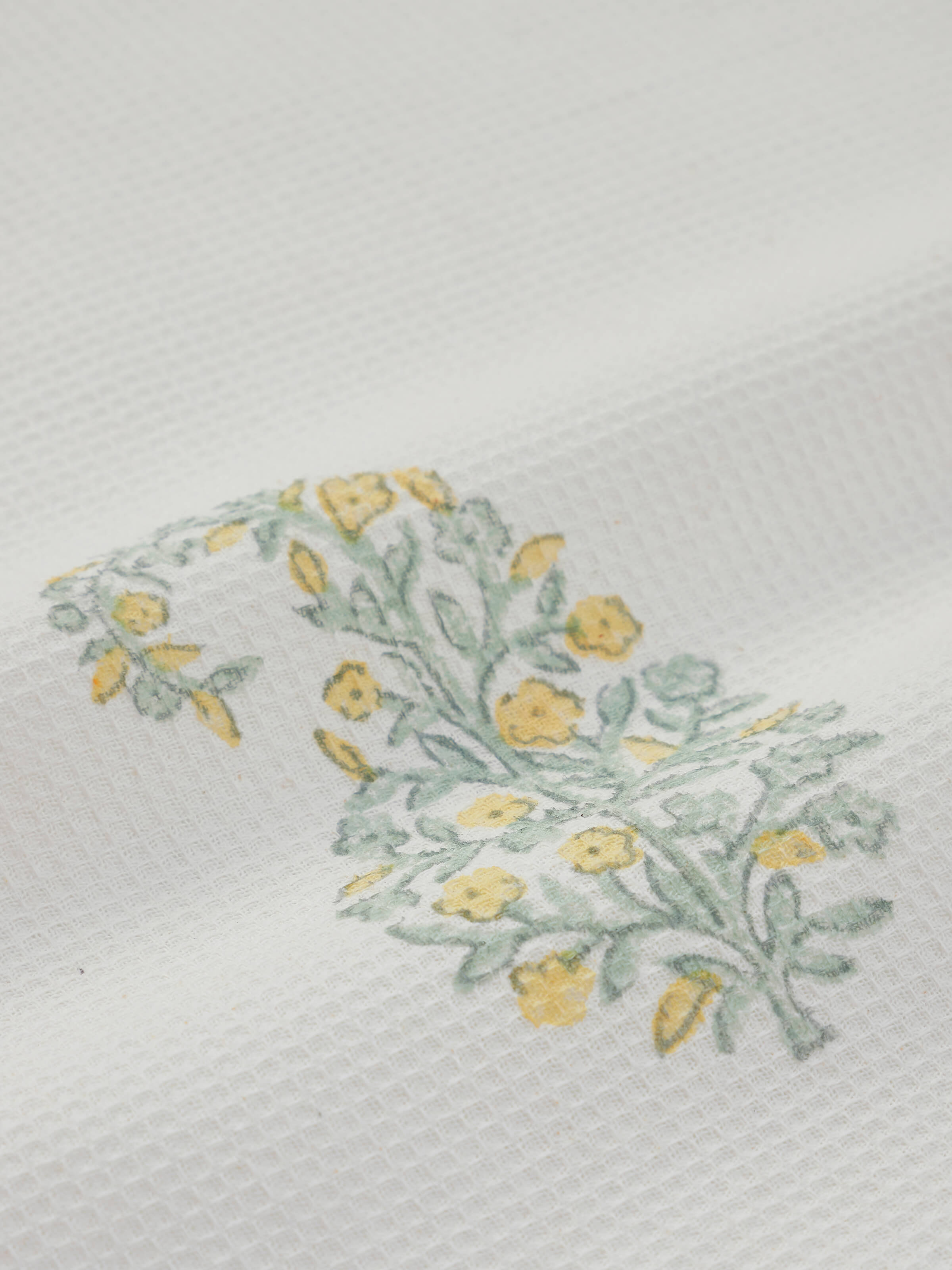 Detailed shot of Ambi Buta Yellow Floral Cotton Sanganeri Block Printed Face Towels focusing on the intricate block print.