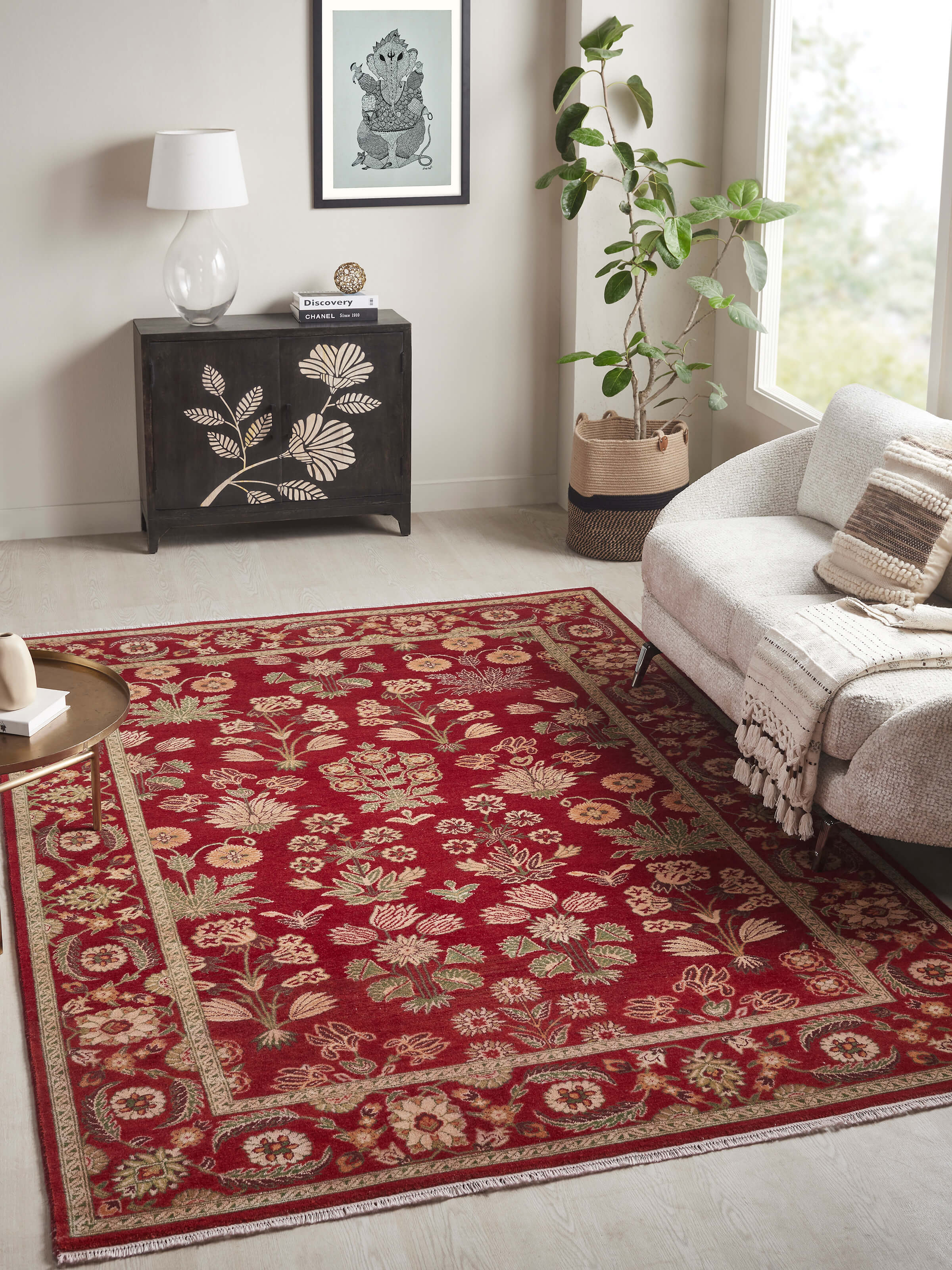 Lifestyle image showcasing the Red Agra Wool Carpet with intricate Mughal floral motifs in a classic interior