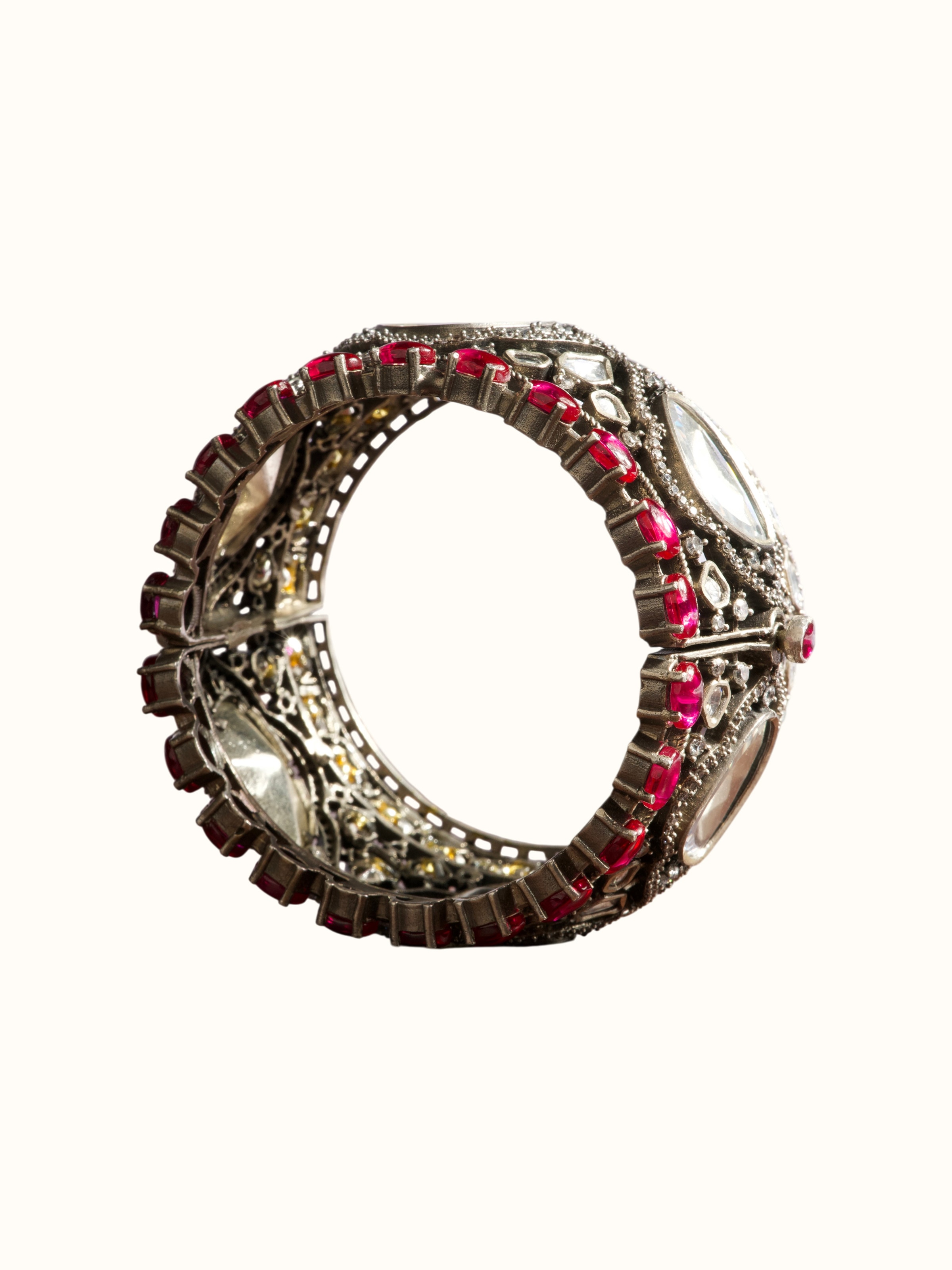 angled view of dank polki silver bangle