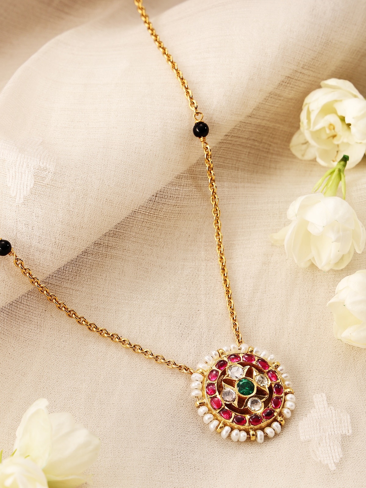 Close-up of Kundala Velai 22 Karat Gold Mangalsutra focusing on the intricate patterns and shine.