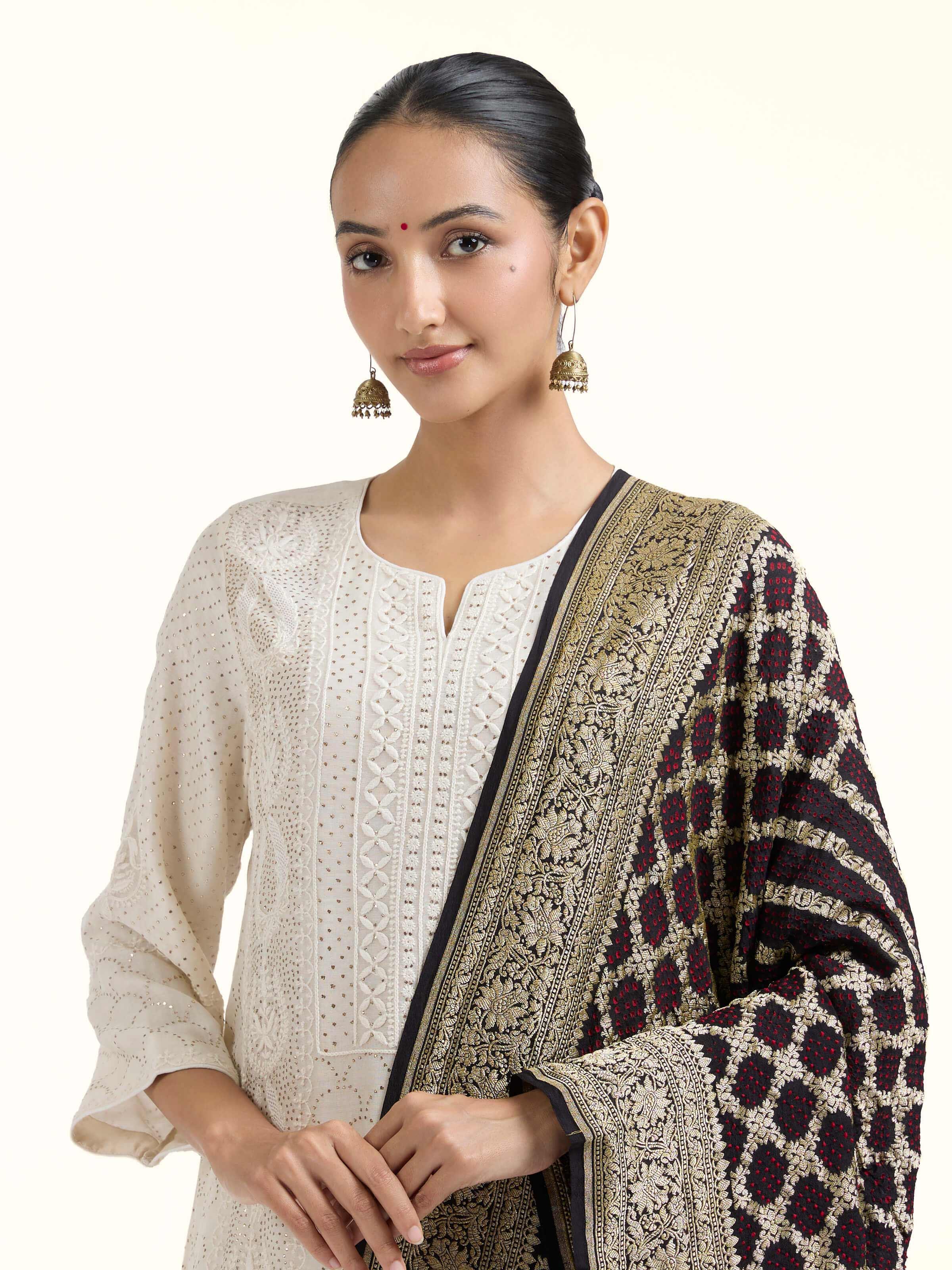 Angled view of Black Bandhani Tie & Dye Silk Dupatta revealing the depth of its color and intricate pattern