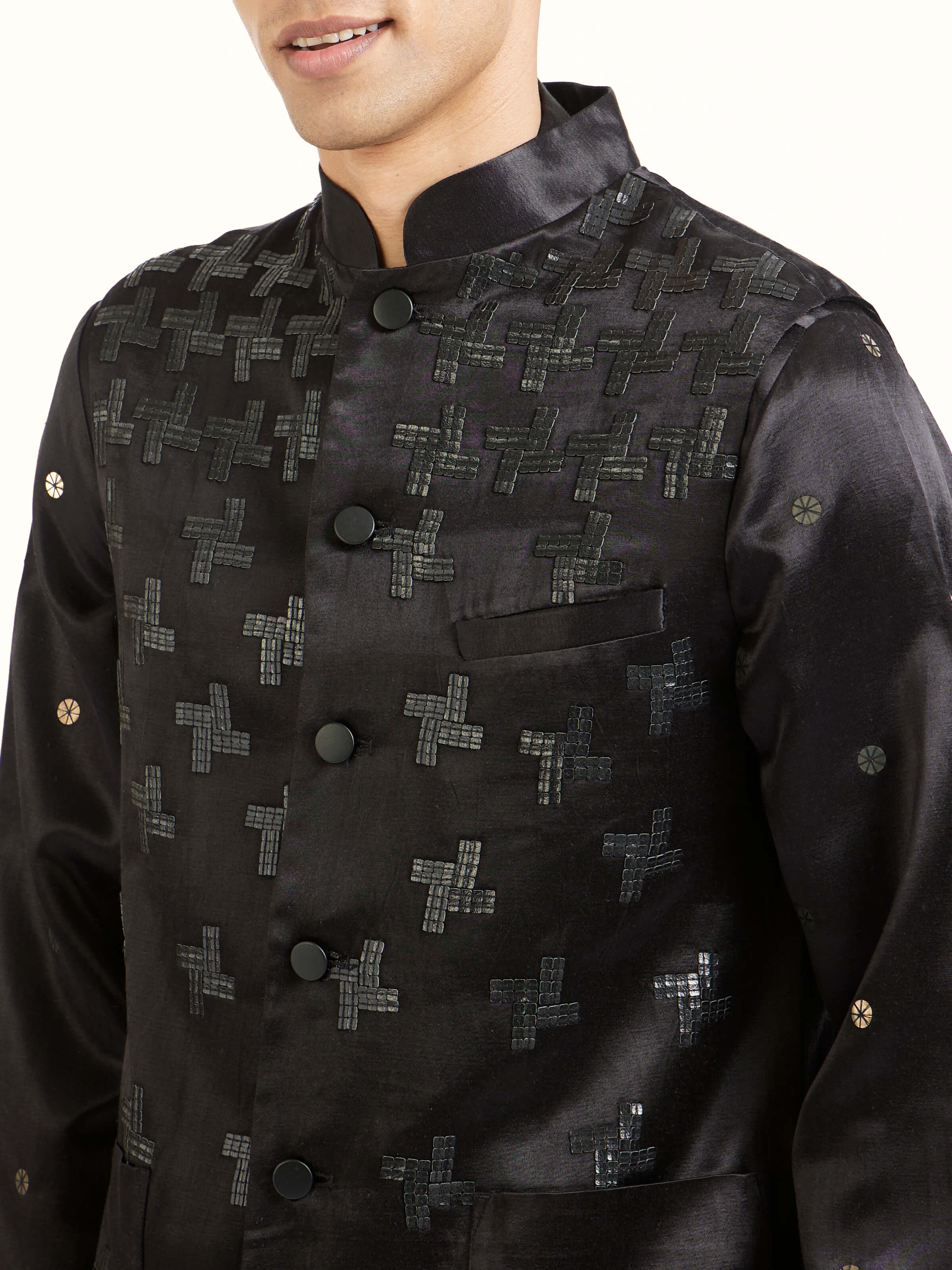 Detail view of black hand embroidery ethnic jacket showing craftsmanship and texture